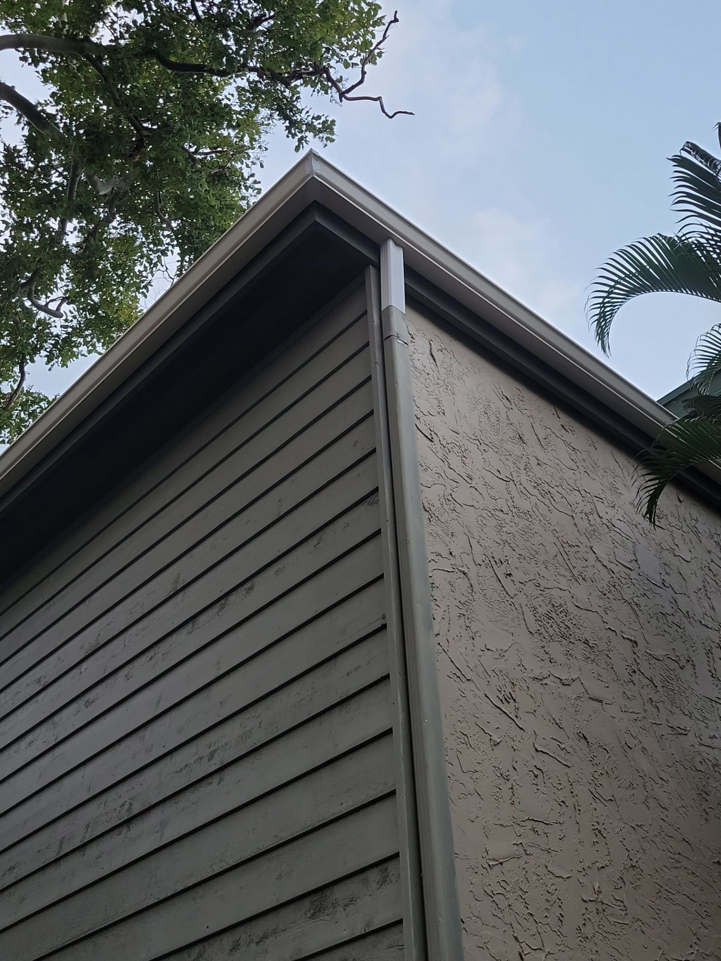 White Gutters Repair and Installation in Sarasota FL by Gutter Professors