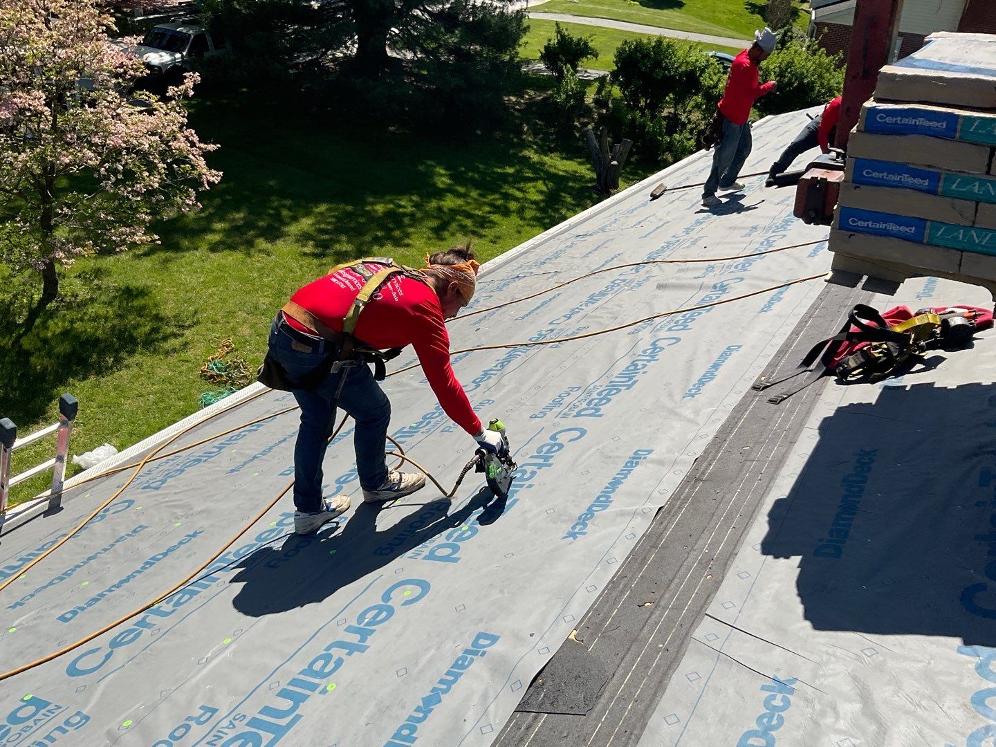 Residential Roofing Installation using Landmark Shingles Color Weatherwood by Alpha Design Services