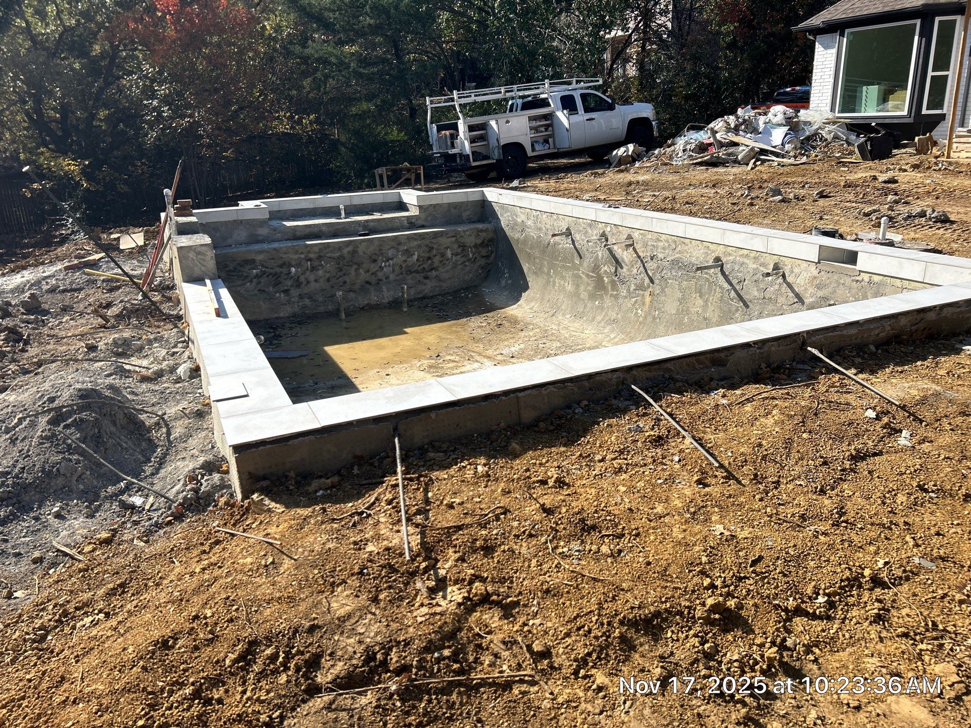 Modern Geometric Pool with Raised Spa and Turf Accents by Pinnacle Pools and Spas - DFW