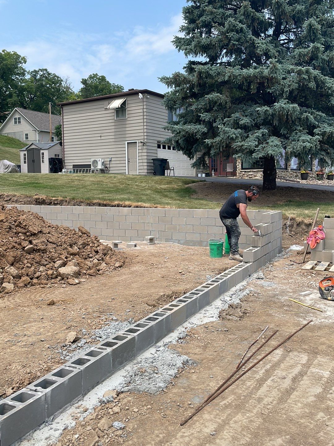 Fence / Retaining Wall using Block then parge by ACE Waterproofing & Basement Solutions