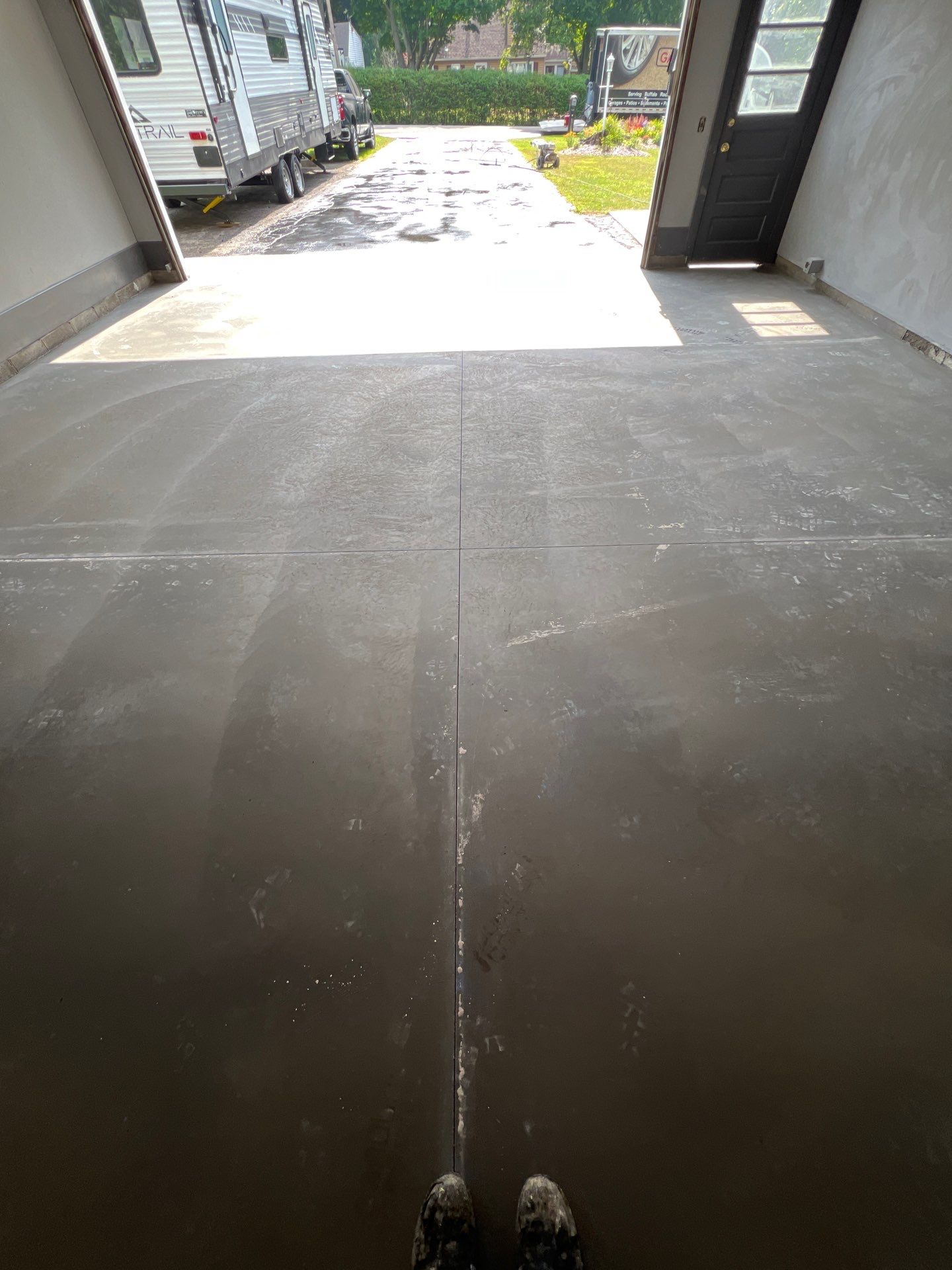 Concrete garage floor replacement and epoxy coating installed  by NG Masonry & Construction LLC