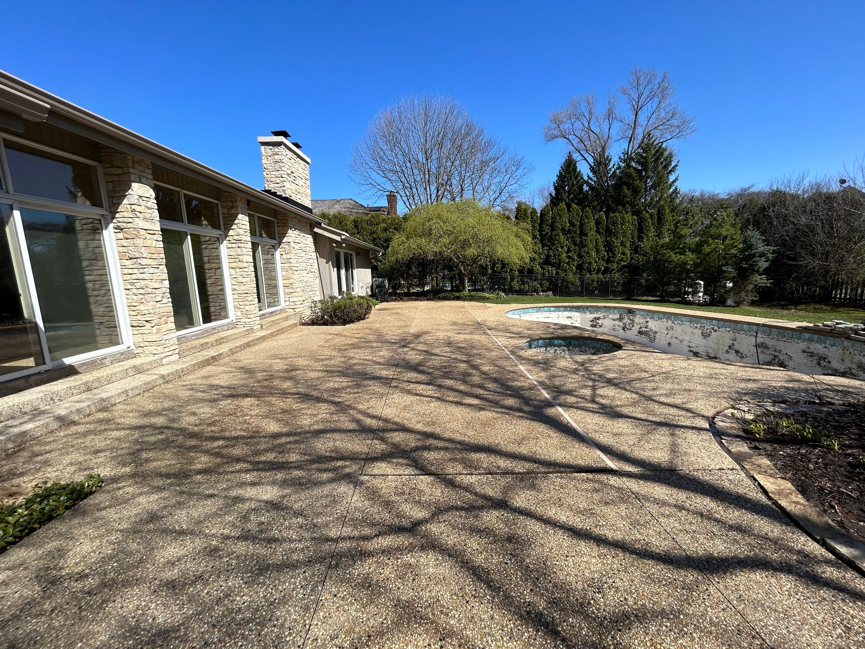 Aggregate Clean and seal using low gloss sealer by Northern Power Washing LLC.