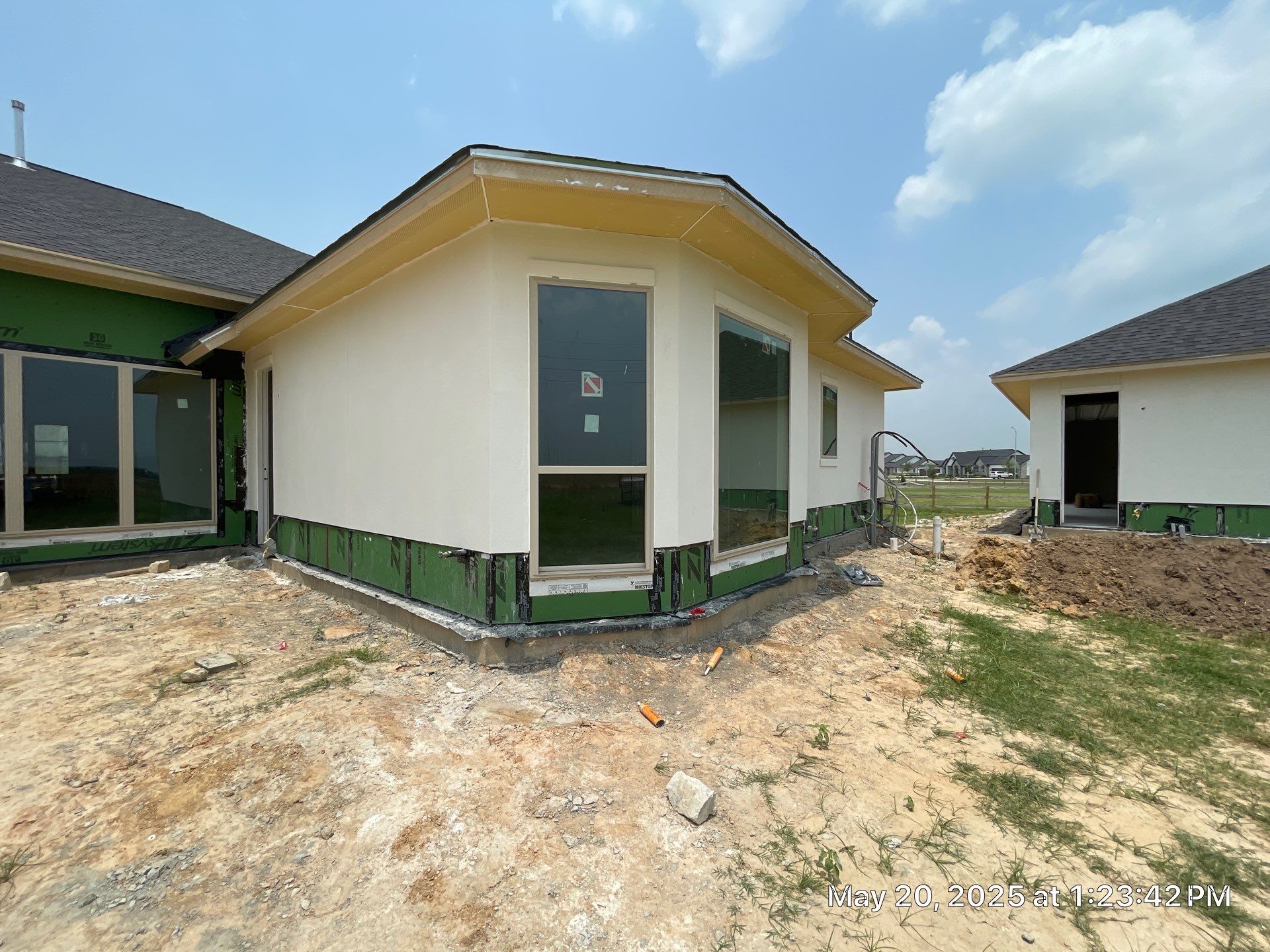 Waller Estate Elegance: Apex Stucco with Grand Stone Accents by Apex Conventional Stucco Llc