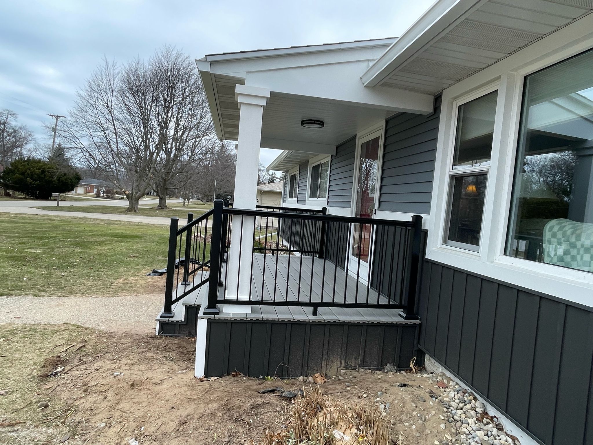 Siding, Front and Back Porch  by Avalon Roofing and Exteriors