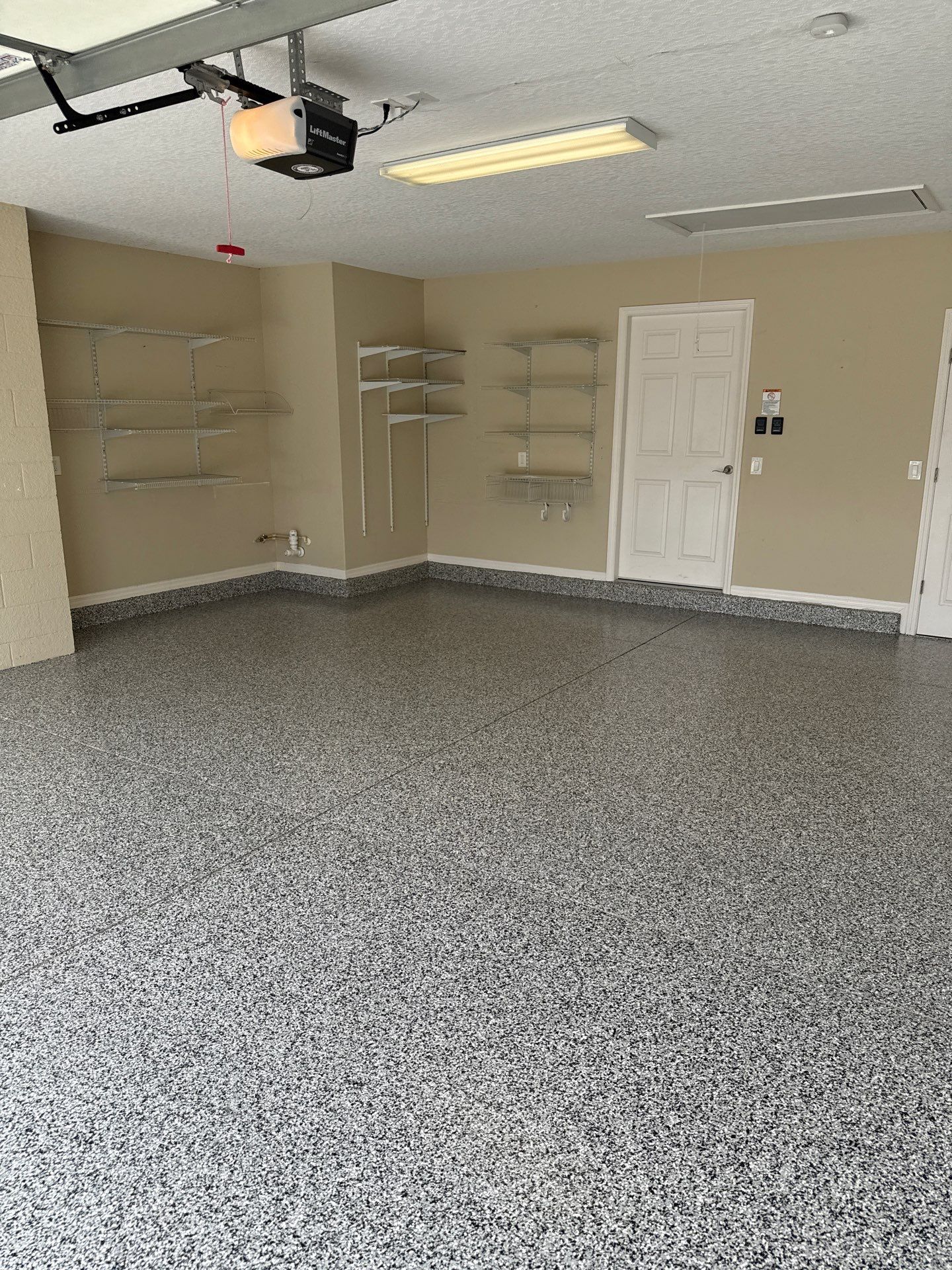 Garage in Domino by Innovative Concrete Coatings 