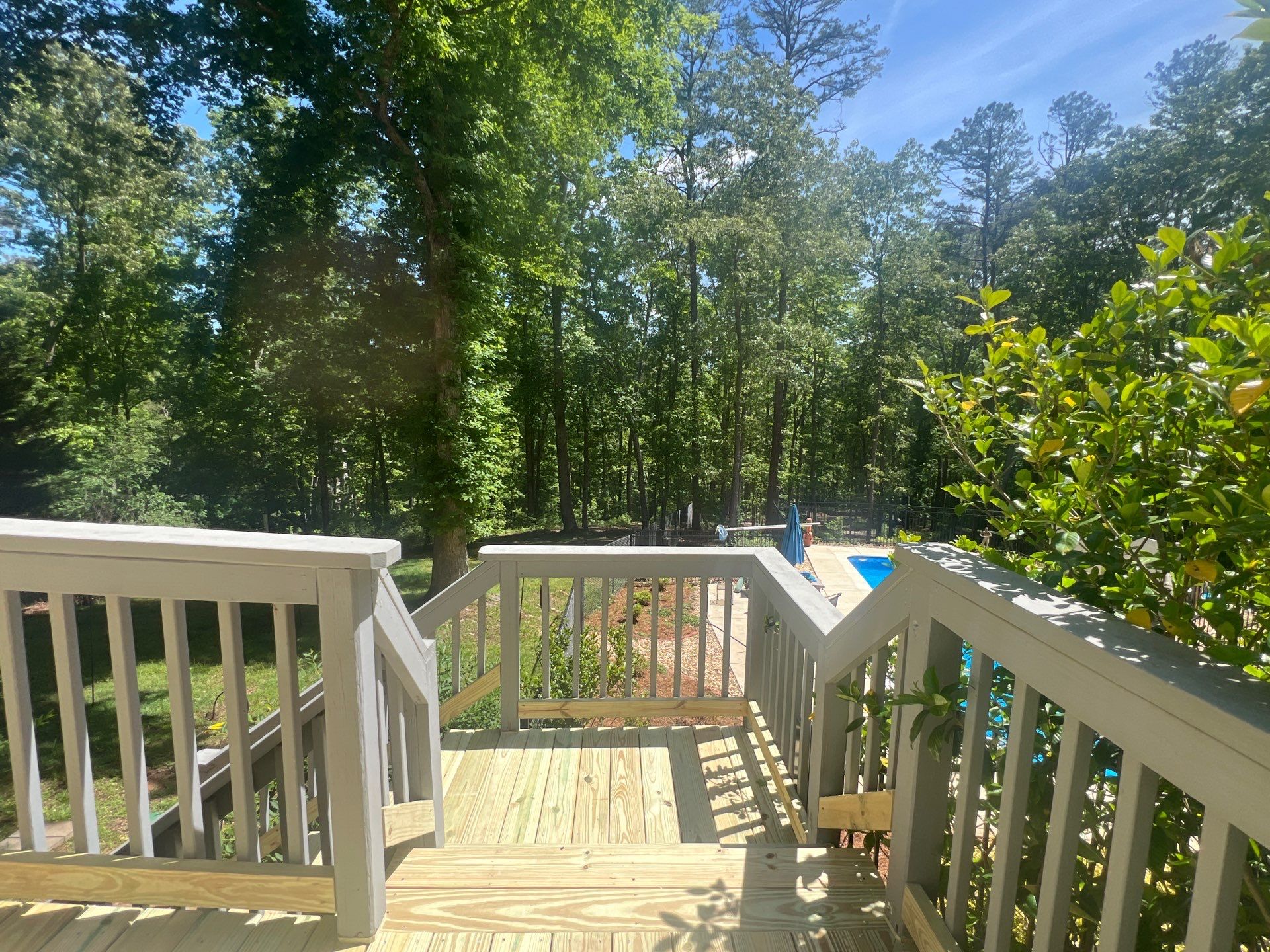 Pressure-Treated Wood Deck Resurfacing and Staircase Reconstruction in Canton by Swift Home Renovations