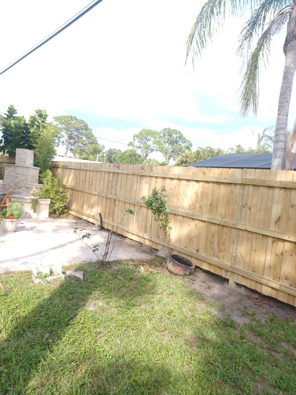 Sarasota, FL 6ft. Tall Treated Board on Board Wood Fence by Asap fence and gates, LLC