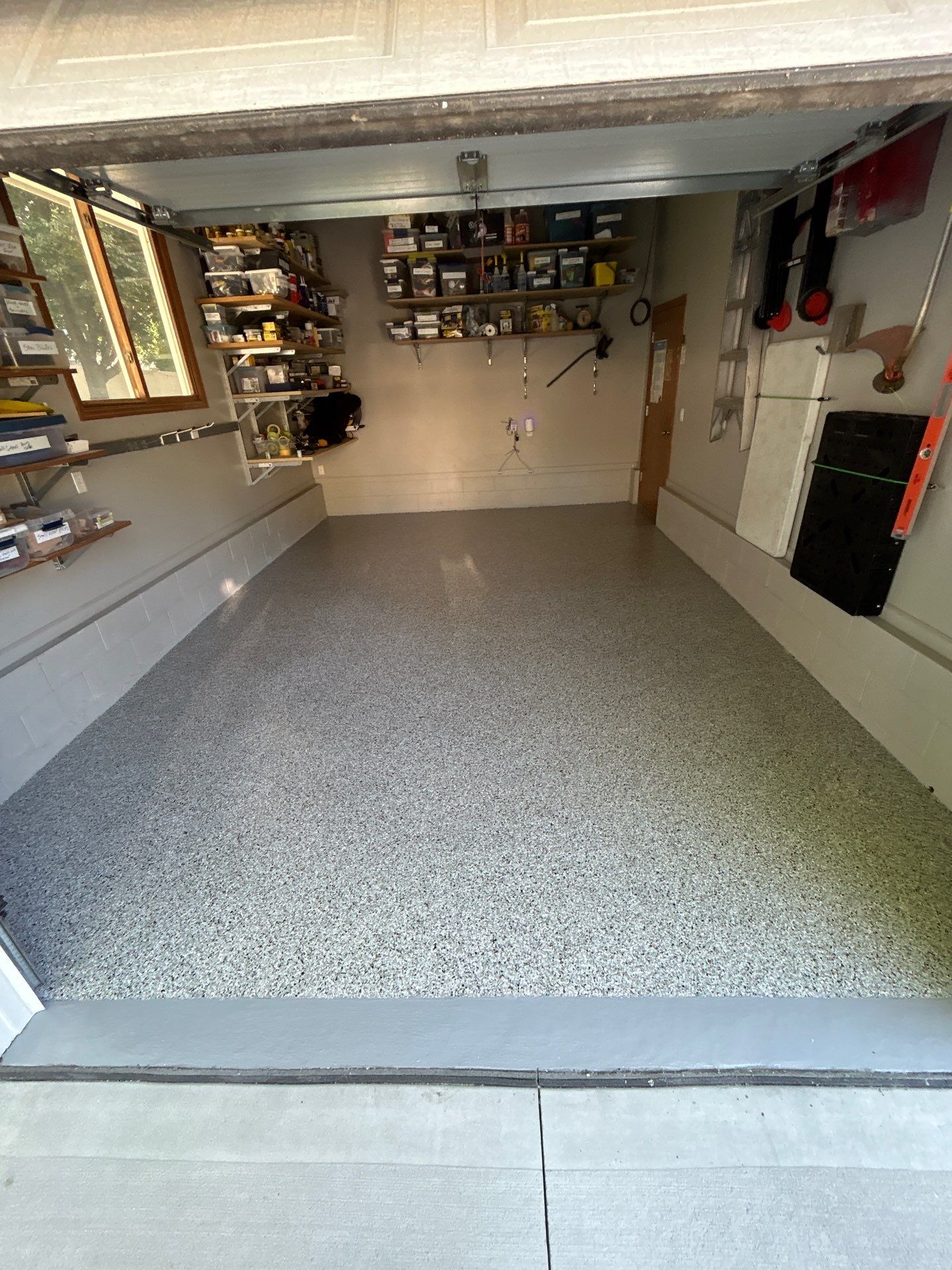 Multi-Phase Epoxy Floor Coating for Omaha Residential Garage by Granite Garage Floors