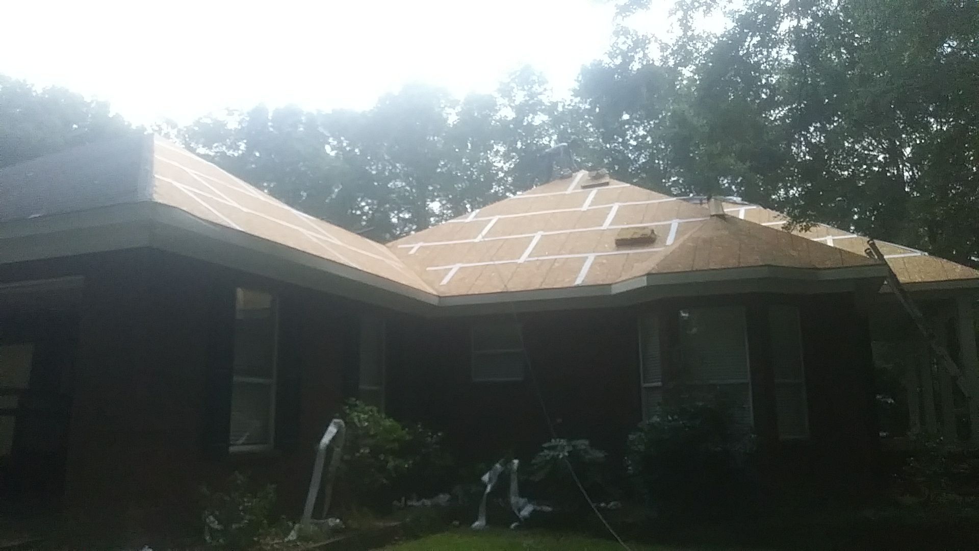 Residential Roofing Installation using Metal roofing by American Roofing & Construction LLC