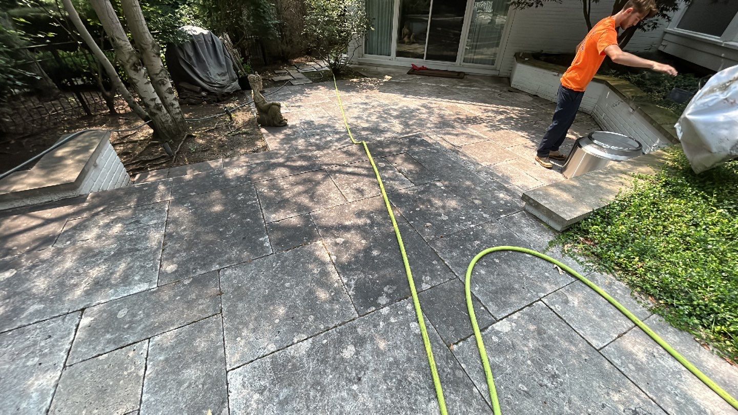 marble patio cleaning and sanding using Polysweep polymeric sand by Northern Power Washing LLC.
