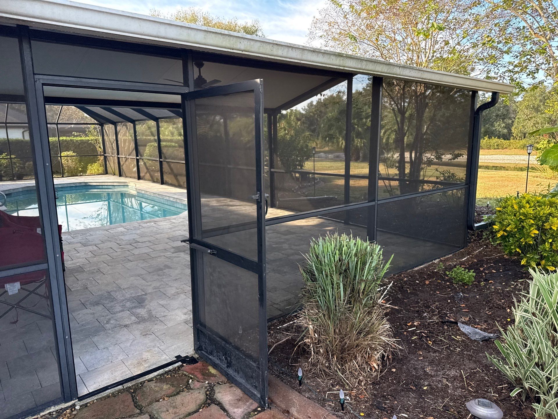 Paver Pool Deck & Screen Enclosure Cleaning | River Wilderness, Parrish FL by Sunshine AquaWash