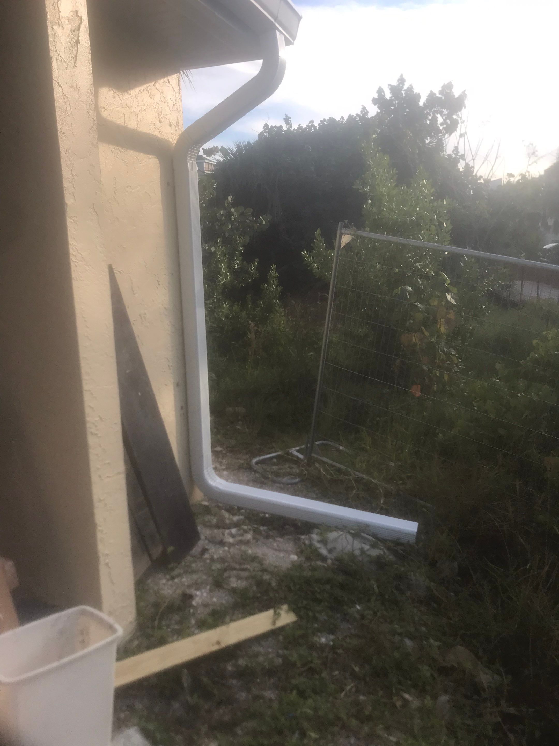 K-Style Seamless Gutter Installation using White Seamless Gutters in Sanibel FL by Gutter Professors