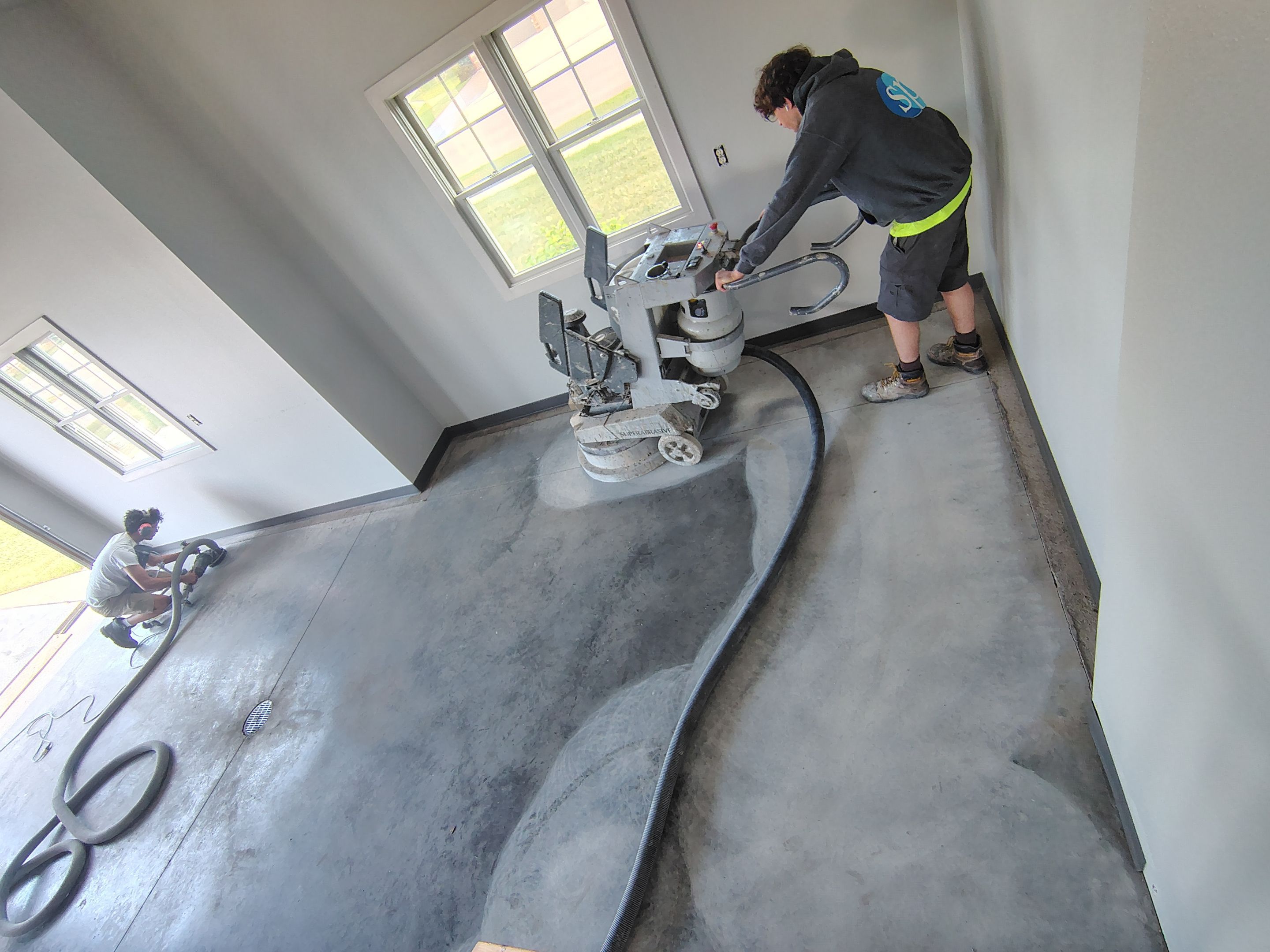 Multi-Car Garage Concrete Coating and Crack Repair in Dell Rapids by Select Painting, Coatings & Garage Cabinets