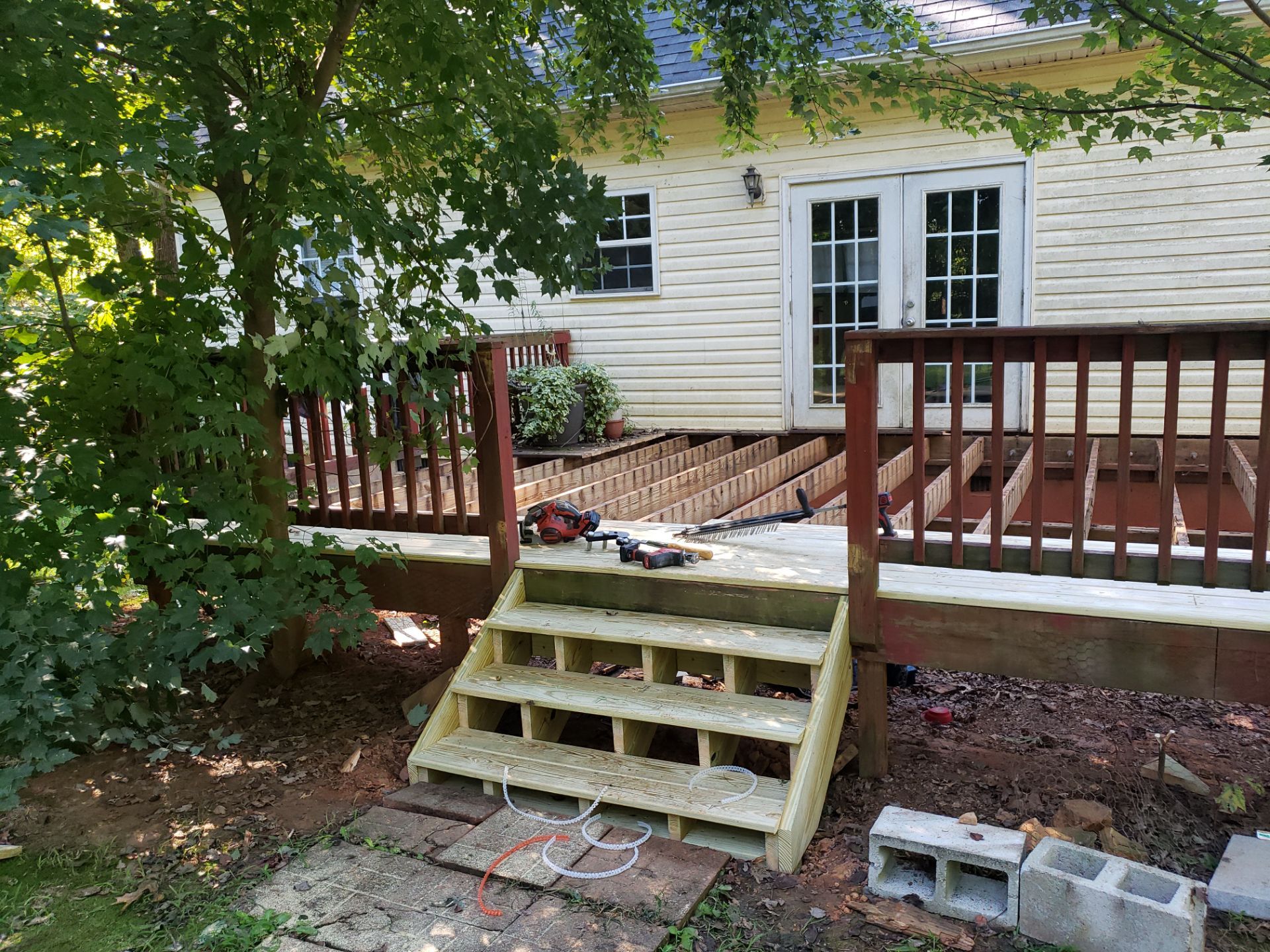 Deck Redecking & Custom Stair Rebuild by A Step Above Handy LLC