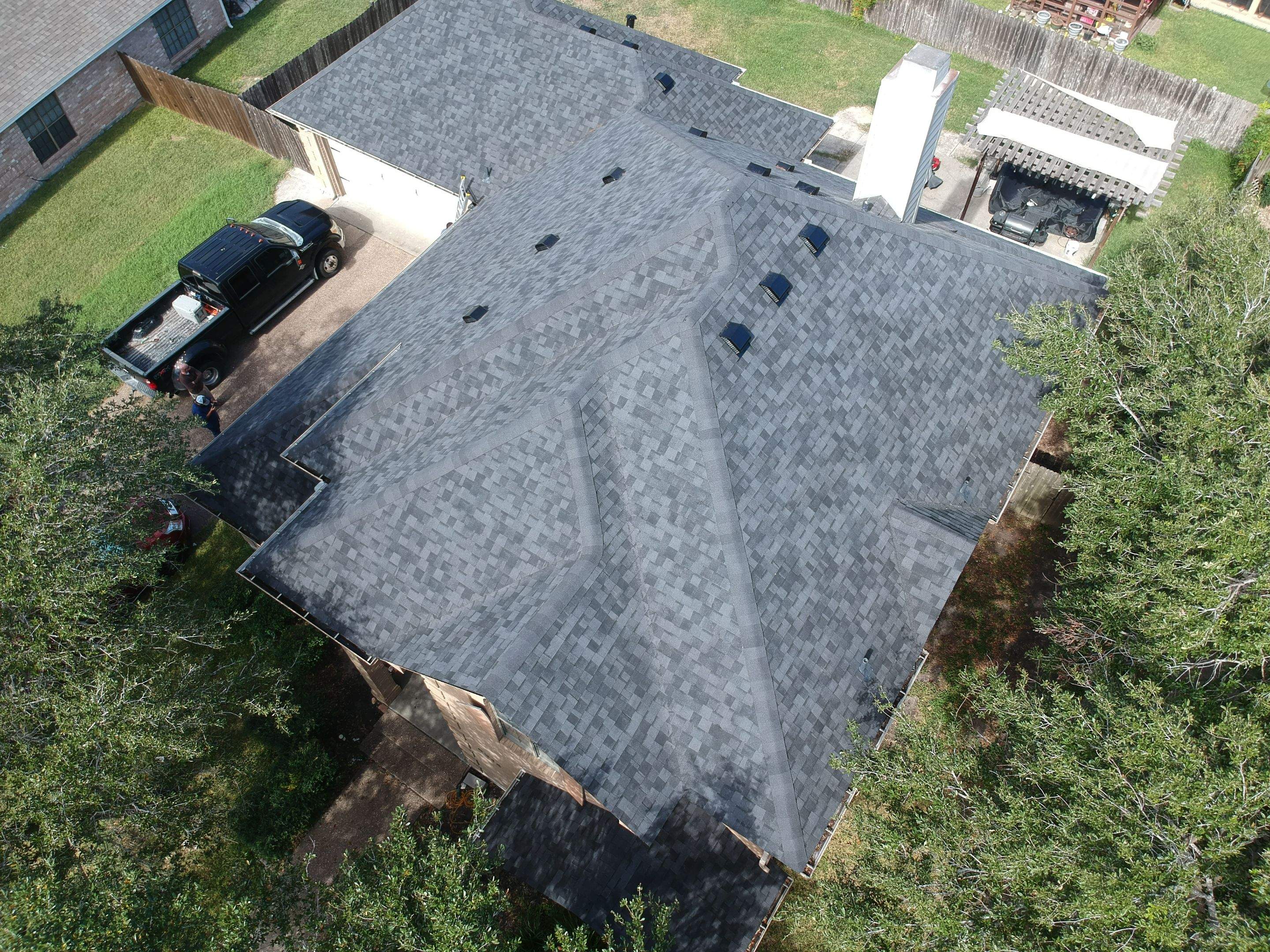 Residential Roofing Installation using Certainteed Landmark Moire Black by Galvan Roofing and Construction