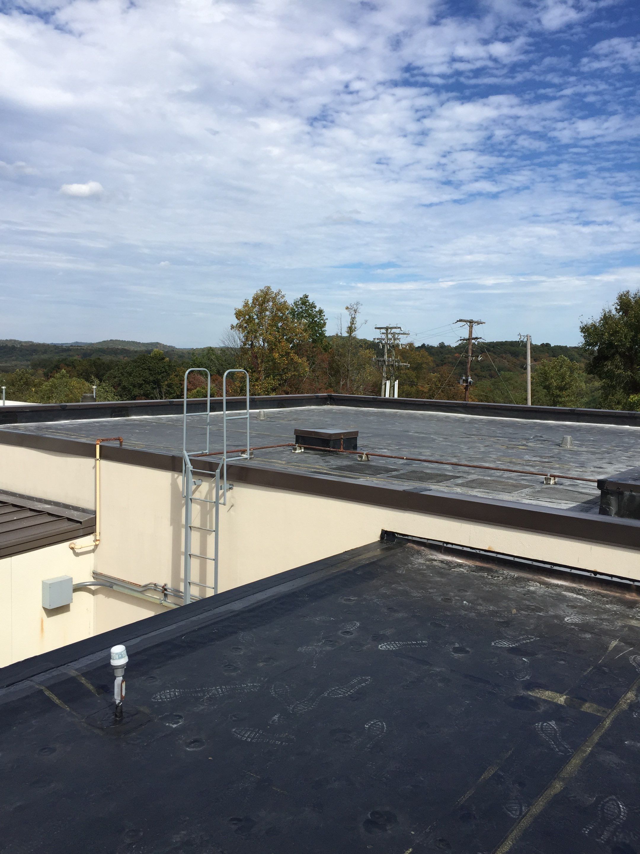 Commercial Rubber Roofing  using Carlisle Rubber Roofing System by Secure Construction Company Inc