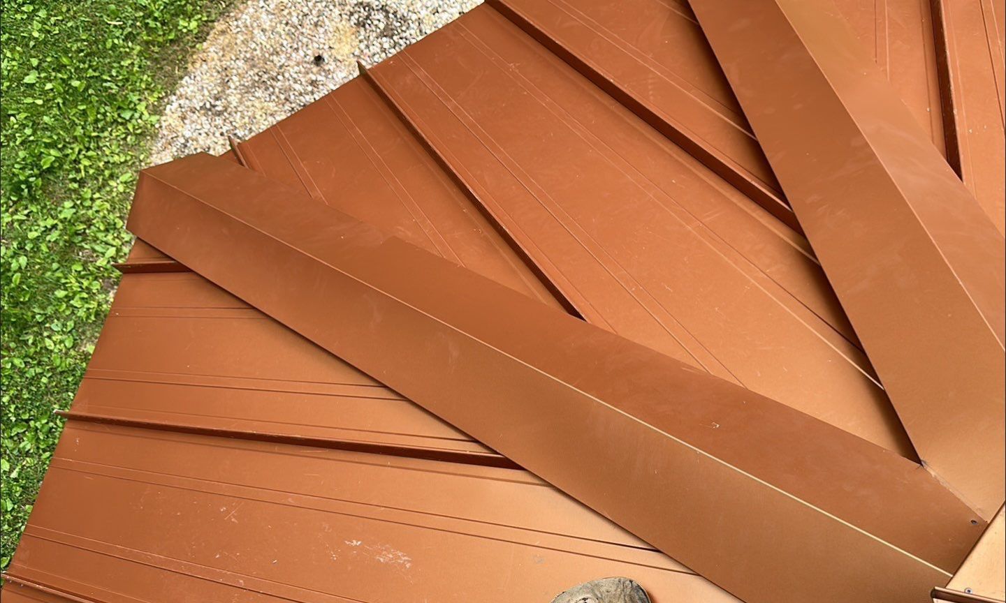 Residential Roofing Installation using Copper Penny Metal Roof by A Plus Exterior