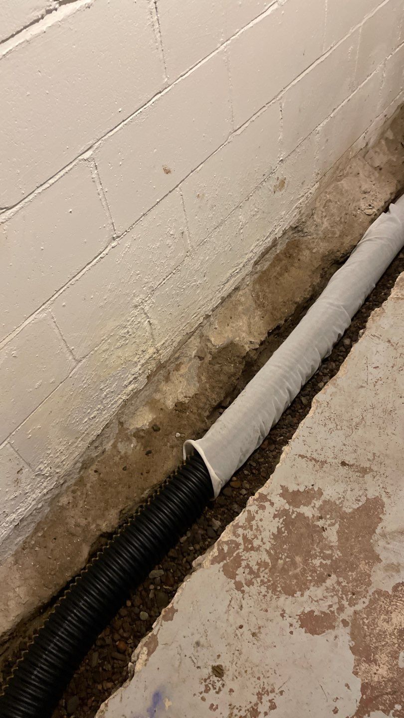 Basement Drain Tile & Sump Pump in Northeast Minneapolis by Waterproofing Northeast