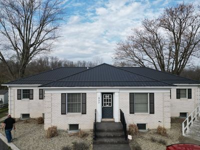 Commercial Roofing Installation using Performance Panel Metal - Frost Black