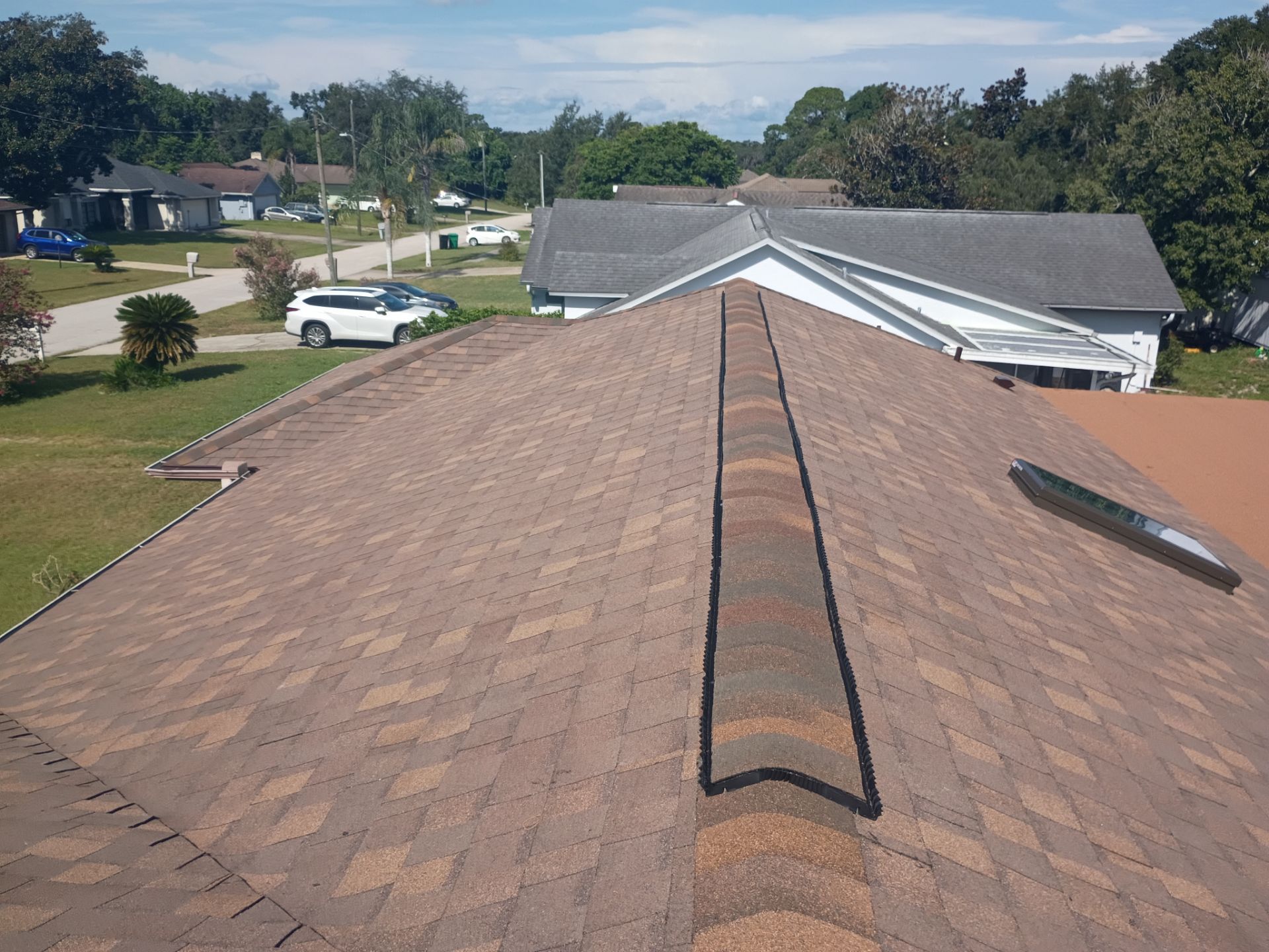 Deltona Roof Replacement Featuring Atlas Pinnacle Sun in Cool Coral Canyon by Pinnacle Roofing Group