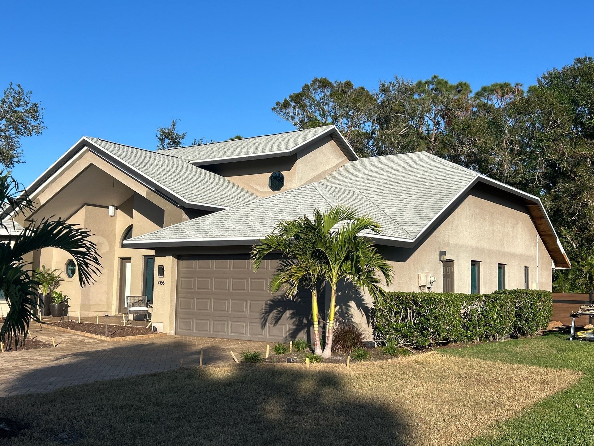 Black Seamless Gutters in Sarasota FL by Gutter Professors
