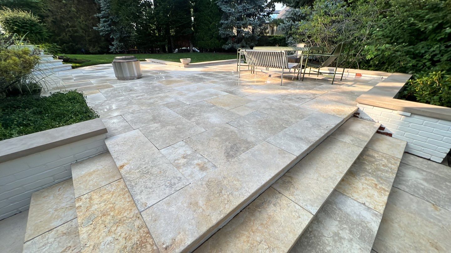 marble patio cleaning and sanding using Polysweep polymeric sand by Northern Power Washing LLC.