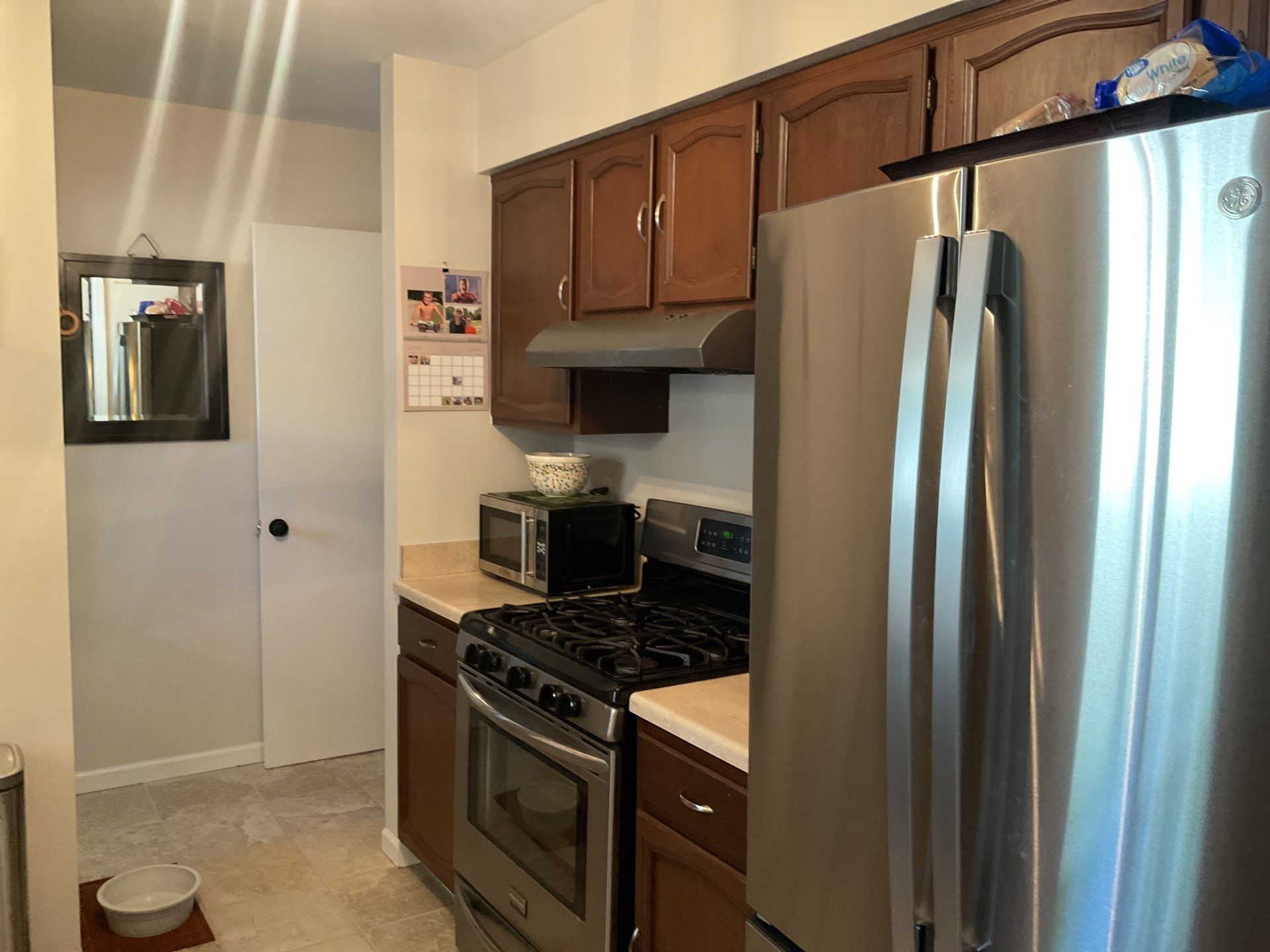 Kitchen Cabinet Refinishing and Butcher Block Countertop Installation in Fenton by Top Shelf Painter