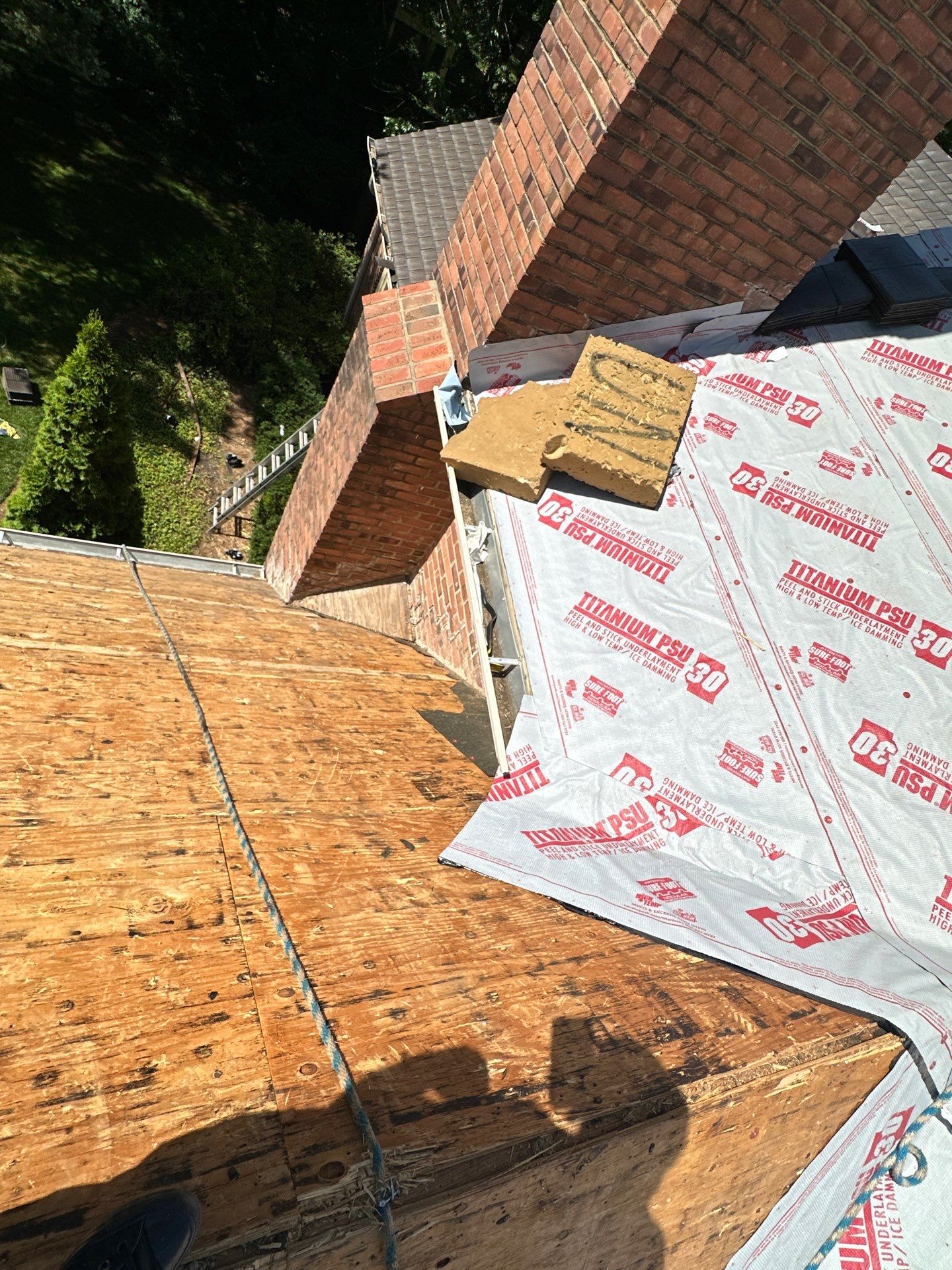 Residential Roofing Installation Using Enviroshake Synthetic Slate by Undersun Roofing 