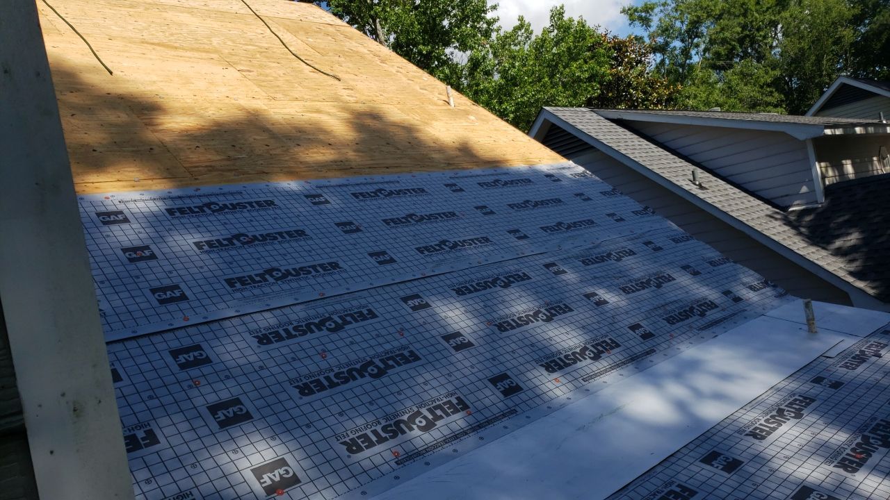 Residential Roofing Installation using Roof Replacement by American Roofing & Construction LLC
