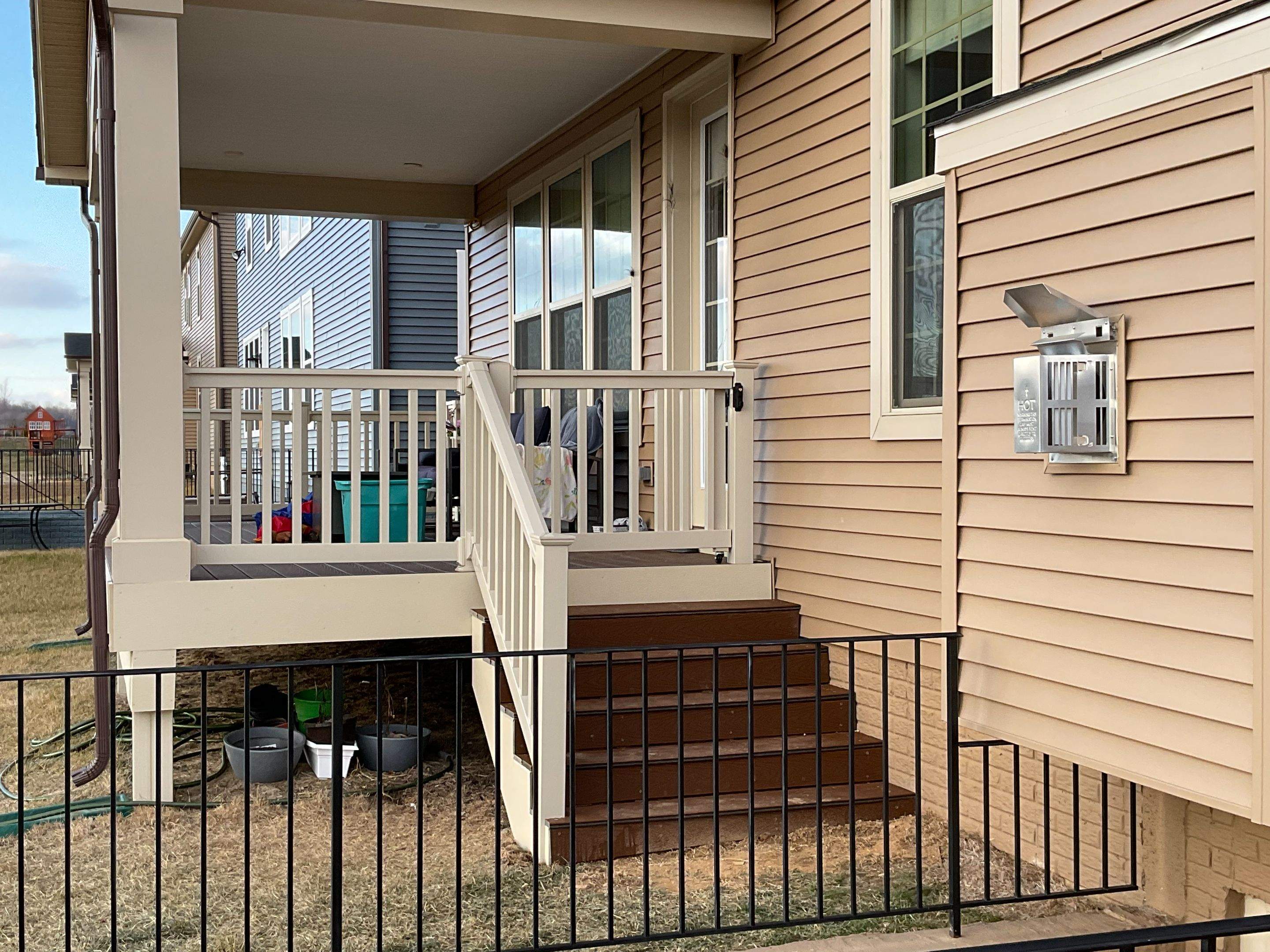 Deck Installation using New Vinyl Gate  by Alpha Design Services