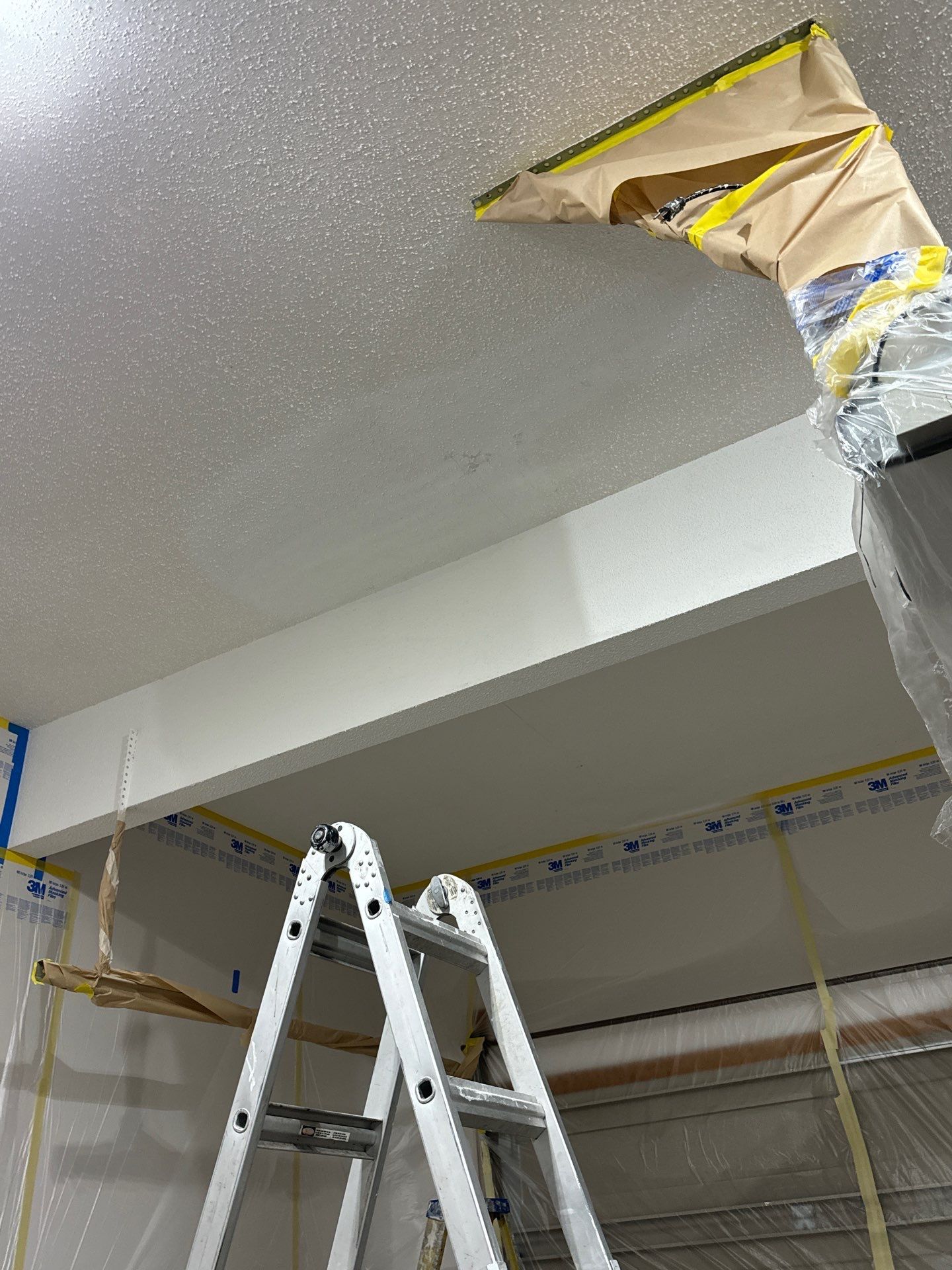 Custom Epoxy Flake Floor Coating and Ceiling Repair in Muskegon by Gordon Painting