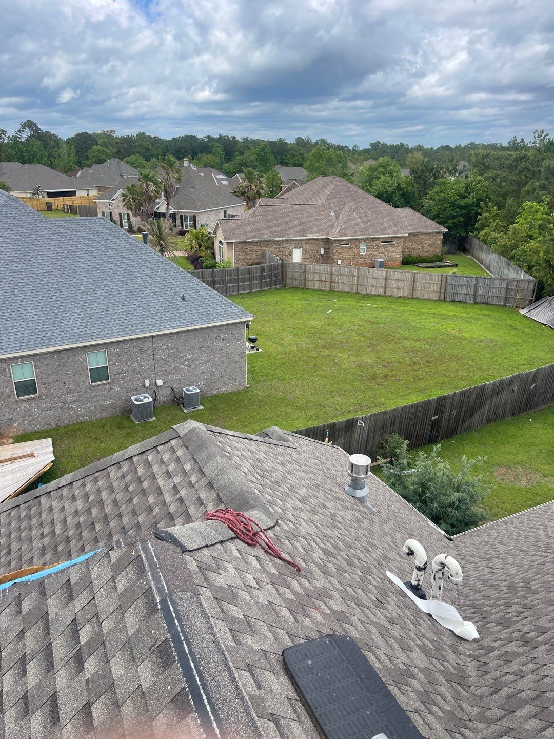 Residential Roofing Installation using Roof Replacement by American Roofing & Construction LLC