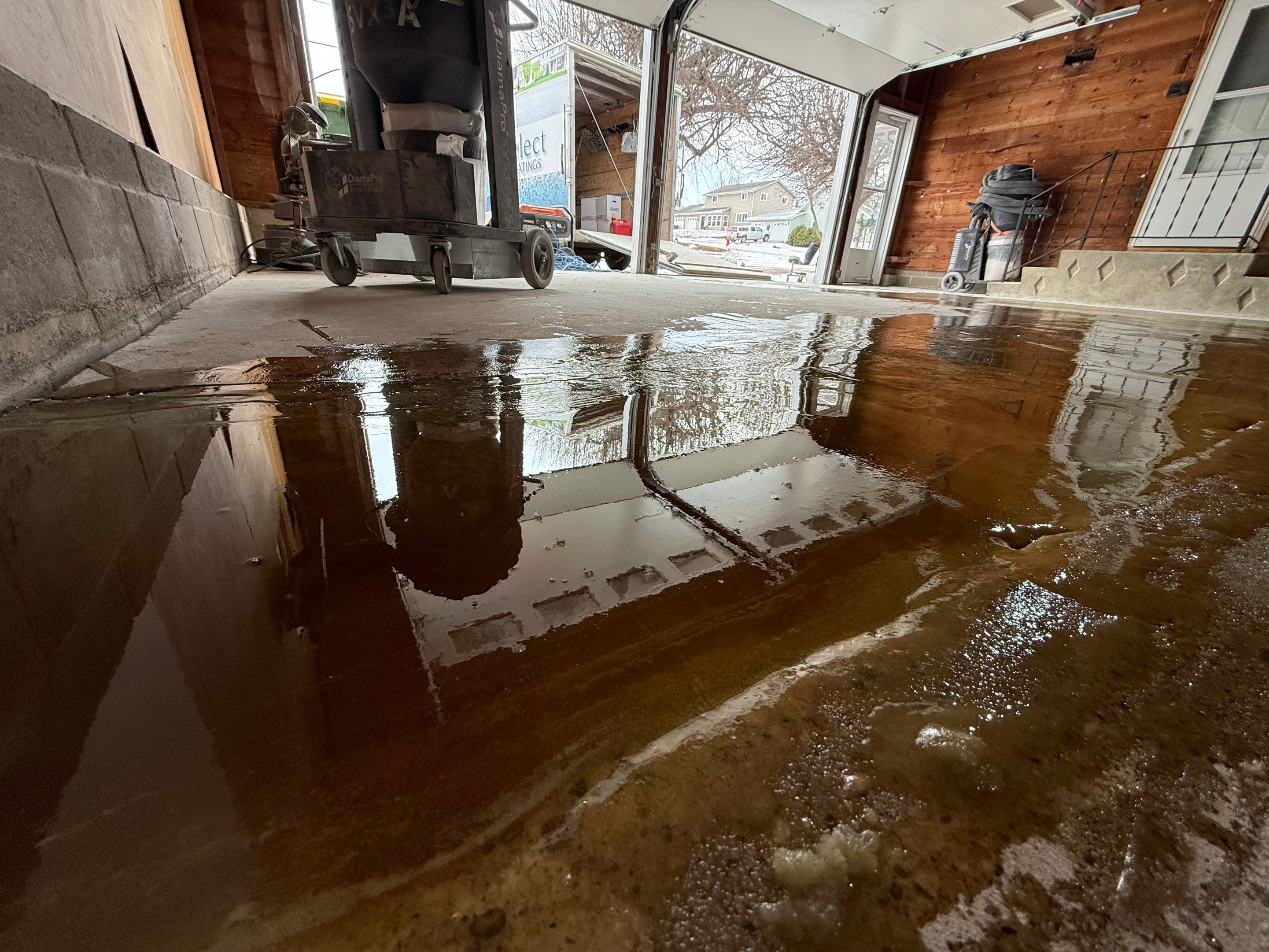 Multi-Colored Epoxy Garage Floor Coating and Concrete Stair Restoration by Select Painting, Coatings & Garage Cabinets