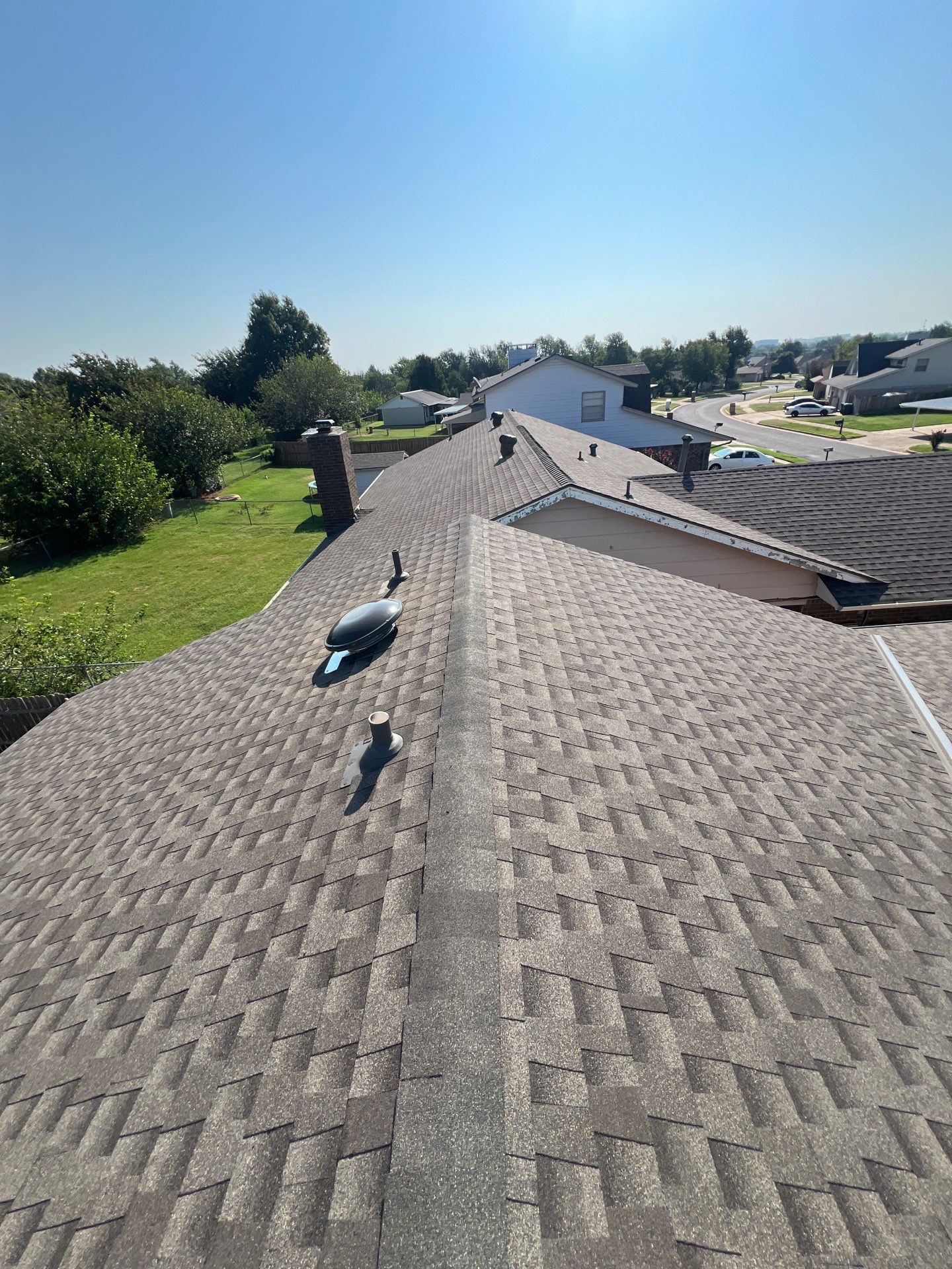 Roof Replacement and Gutter Installation in Oklahoma City, OK by McCann's Roofing and Construction