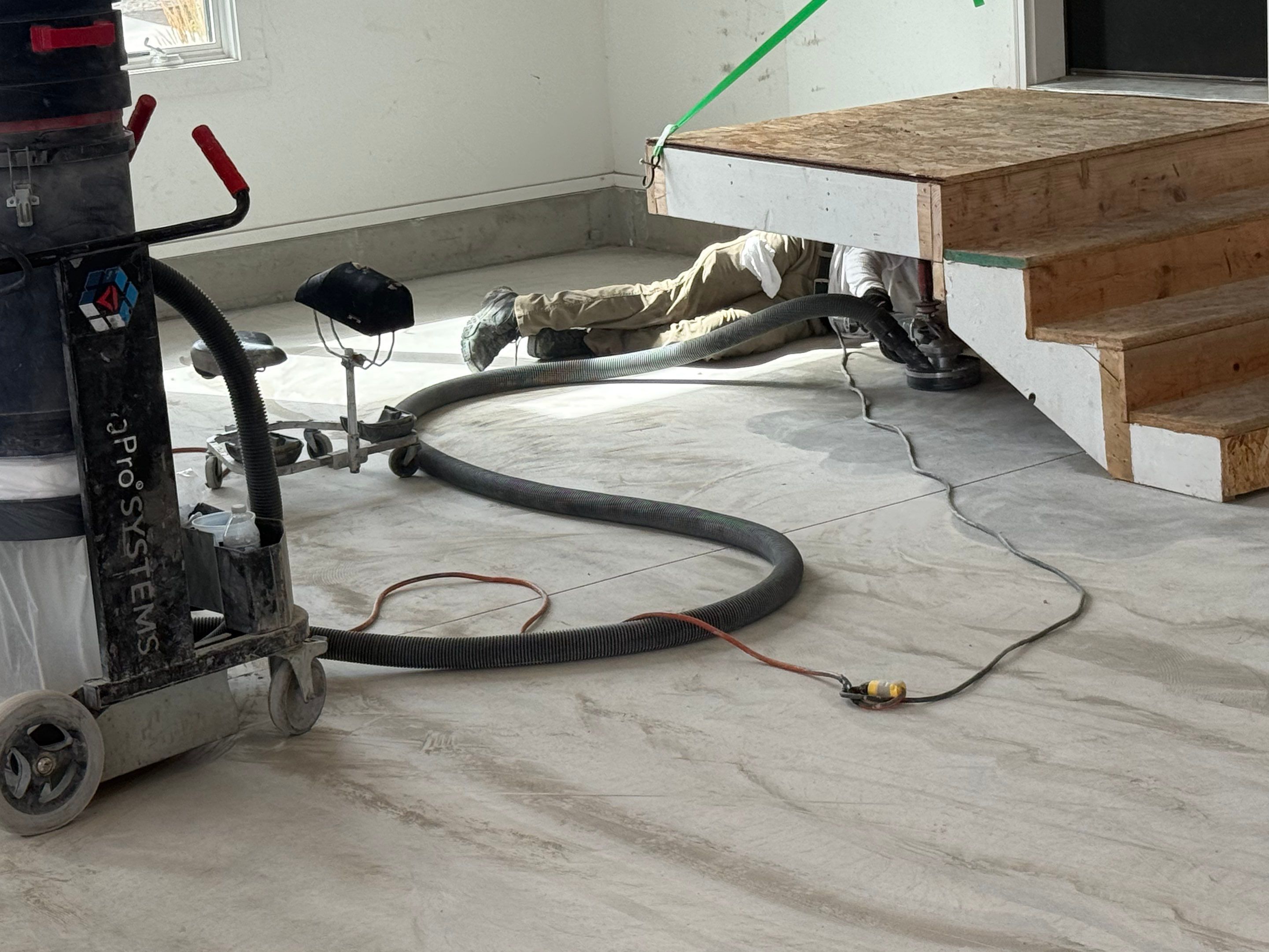 Gravel Flake Garage Floor Coating in Yankton by Select Painting, Coatings & Garage Cabinets
