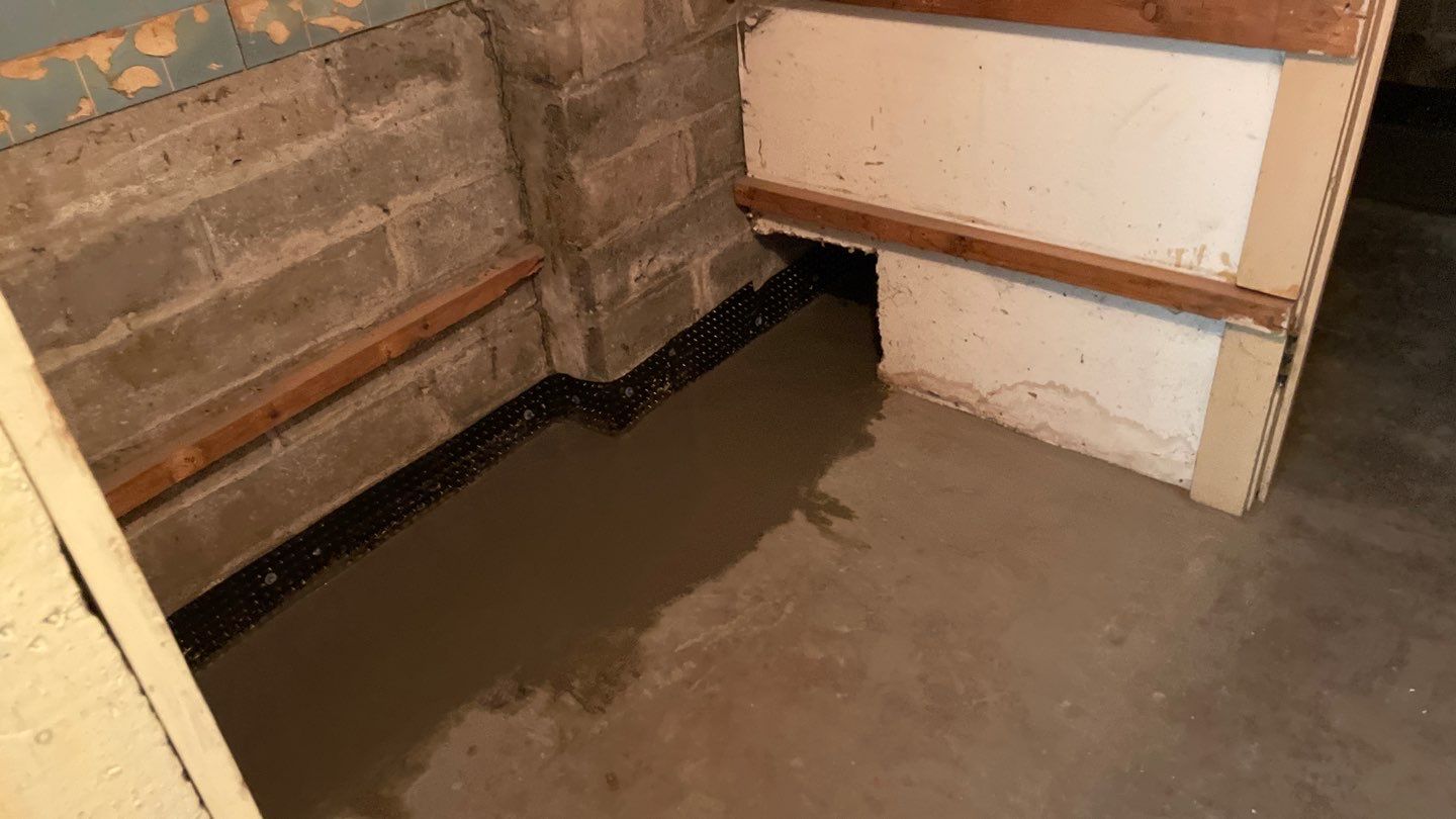 Interior Drain Tile for a South Minneapolis Basement by Waterproofing Northeast