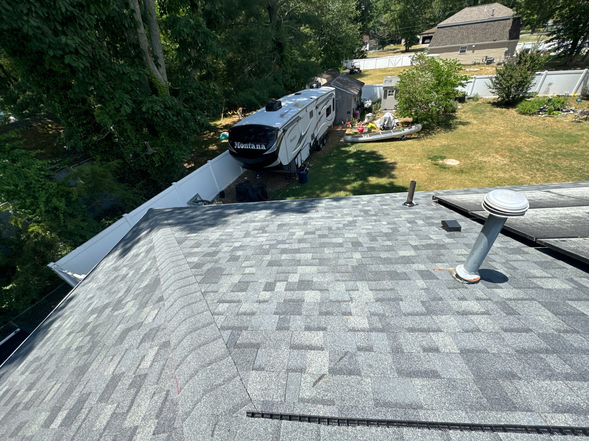 Estate Gray Shingles by Reimagine Roofing