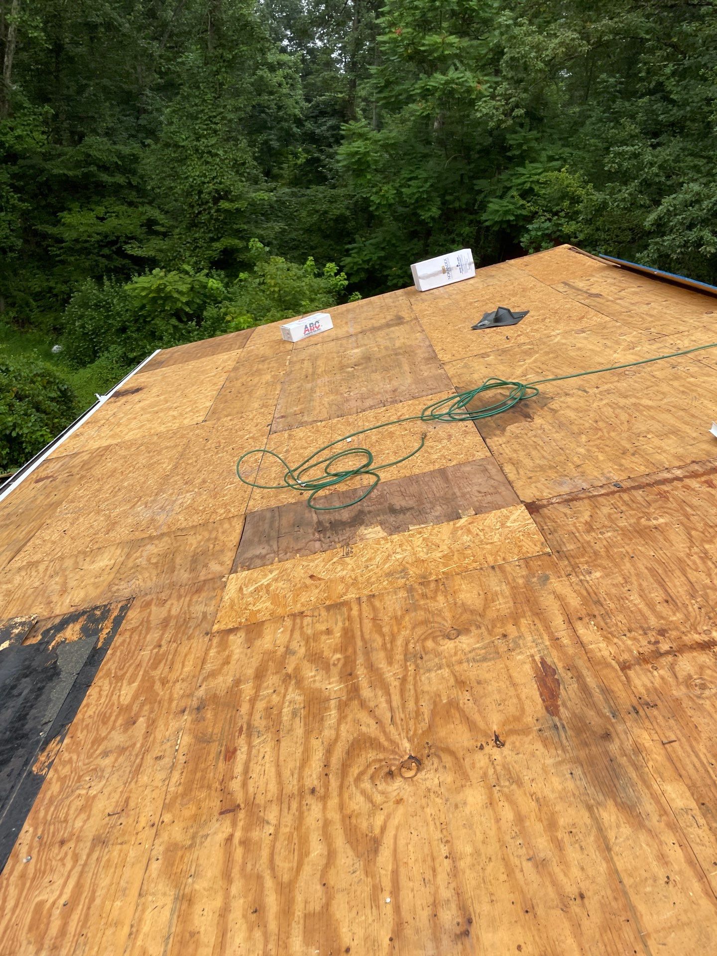 Residential Roofing Installation using GAF Timberline HDZ Charcoal by Rainstoppers Roofing