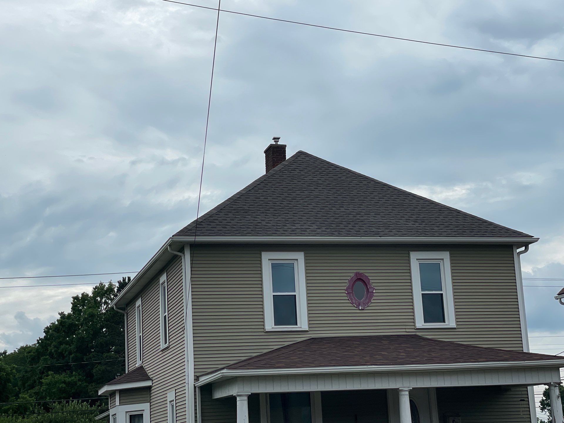 Residential Roofing Installation using GAF Timberline HDZ Charcoal by Rainstoppers Roofing