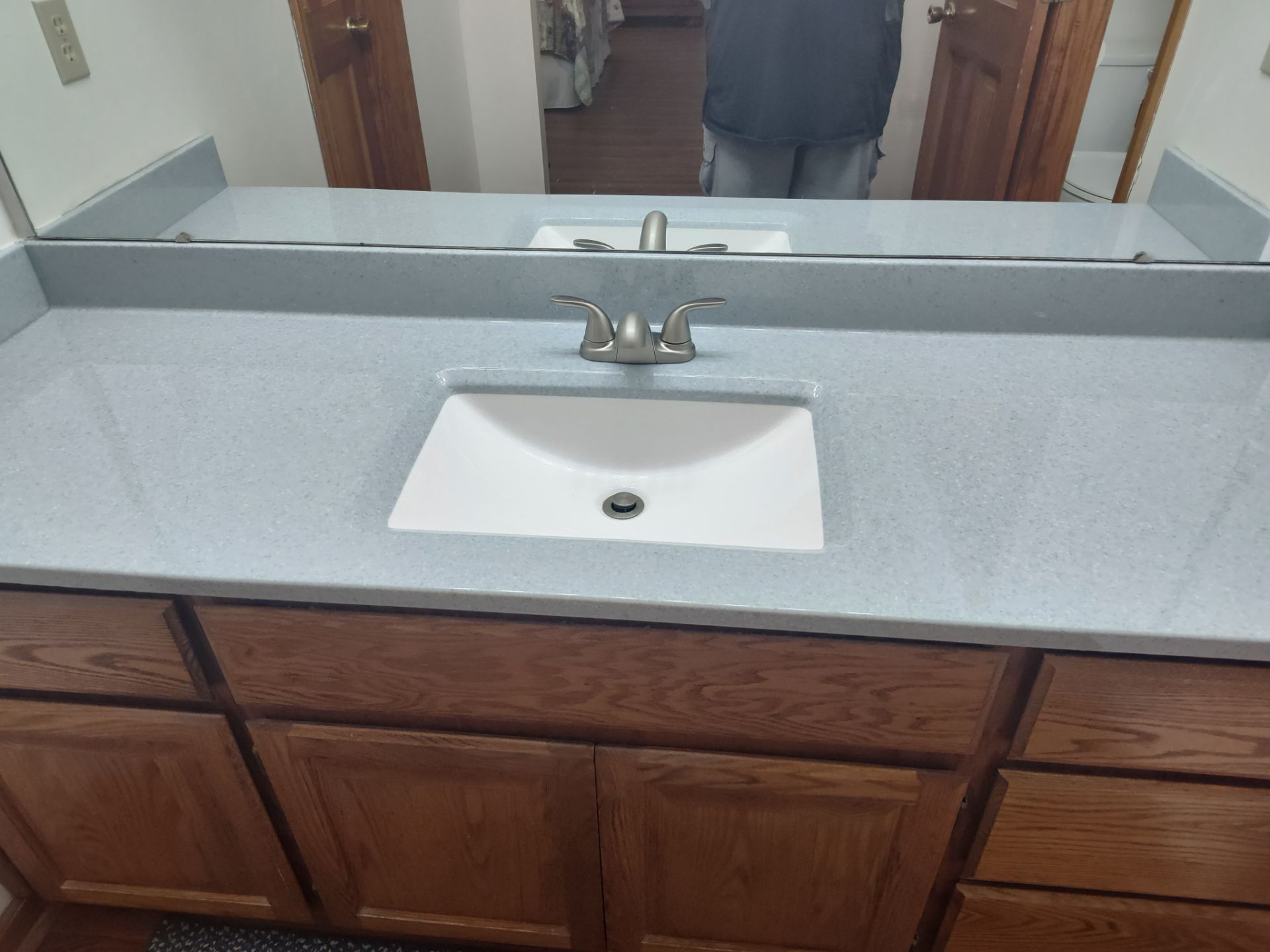 Bathroom Remodel using Onyx base and shower walls with seat & caddie by Cornerstone Home Builders, LLC