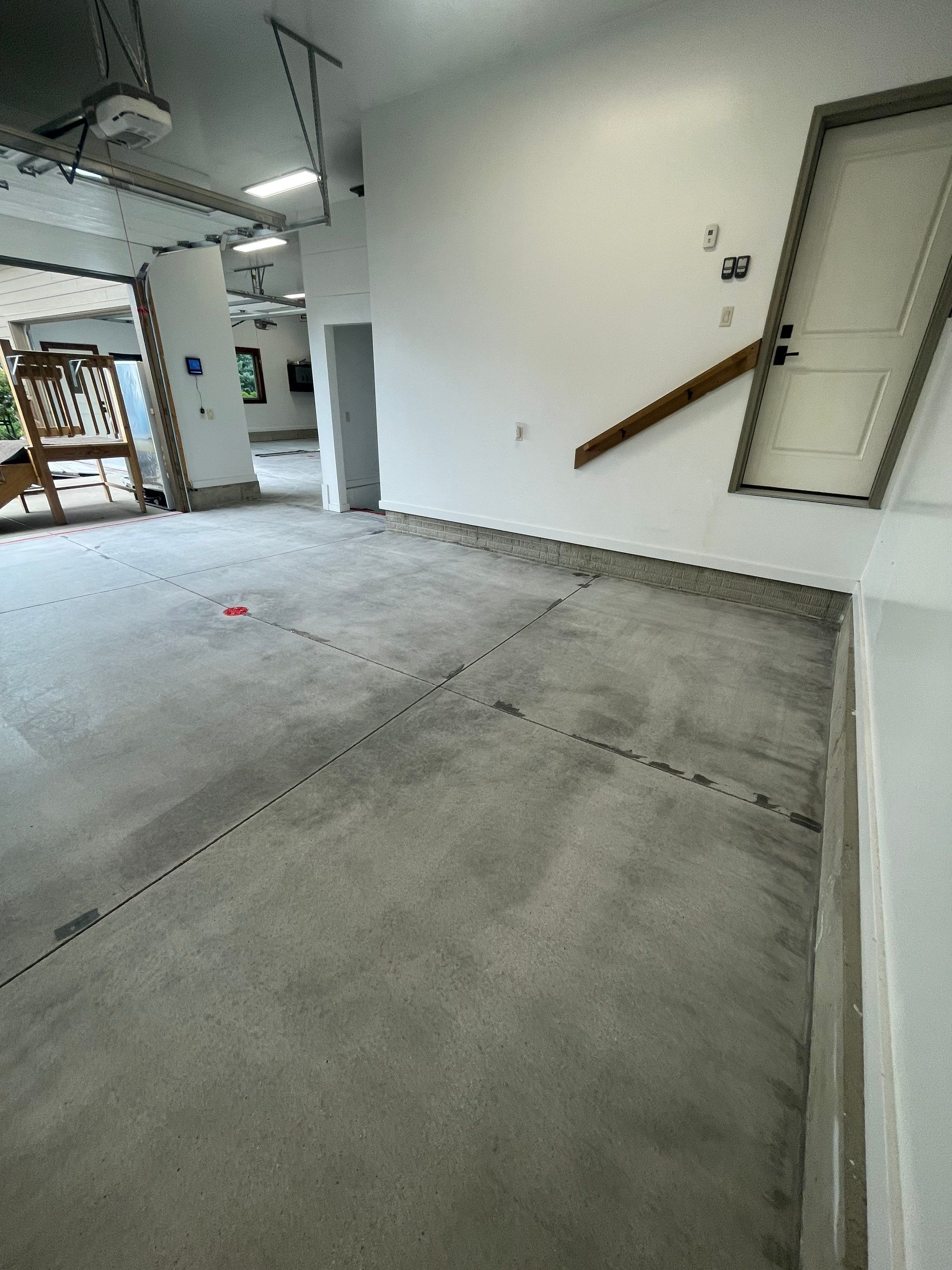 Garage Floor Coating and Domino Flake Finish in Sioux Falls by Select Painting, Coatings & Garage Cabinets