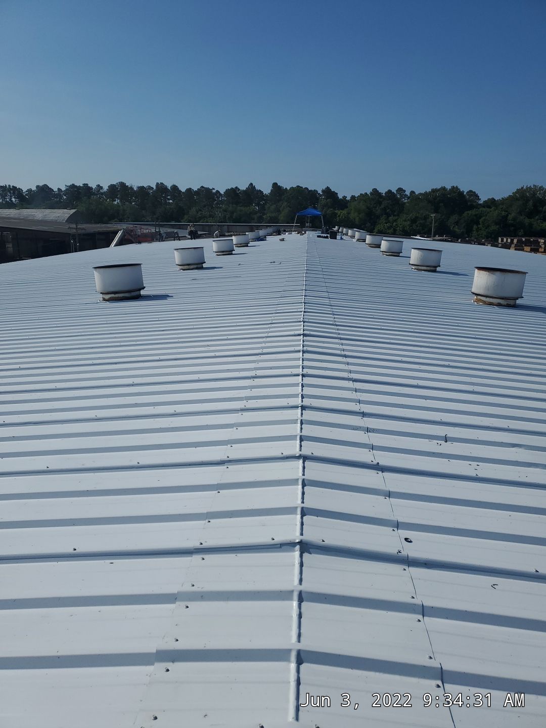 Commercial Roofing Installation using Aluminum Roofing panels by Hostetler Roofing