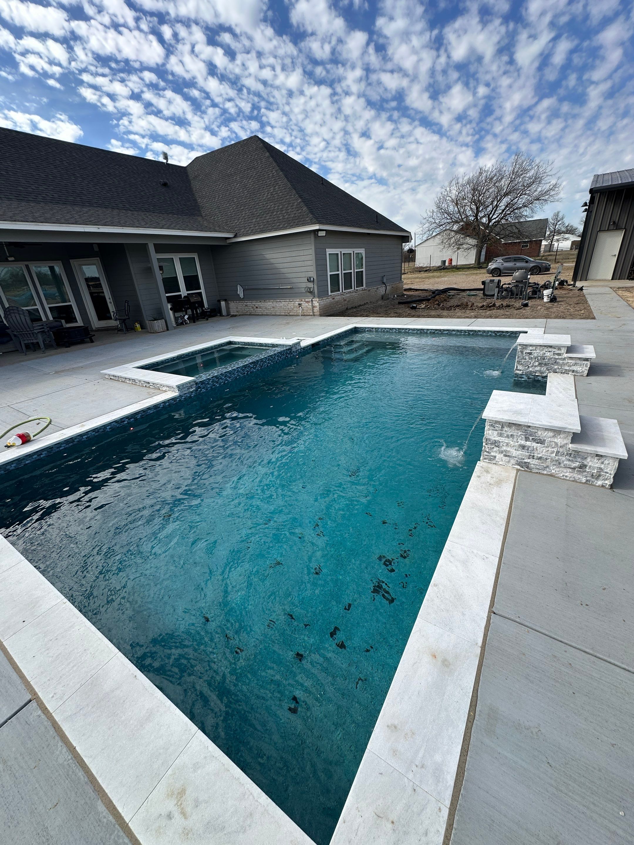 Geometric Pool with Tanning Ledge and Cedar Pergola by Pinnacle Pools and Spas - DFW