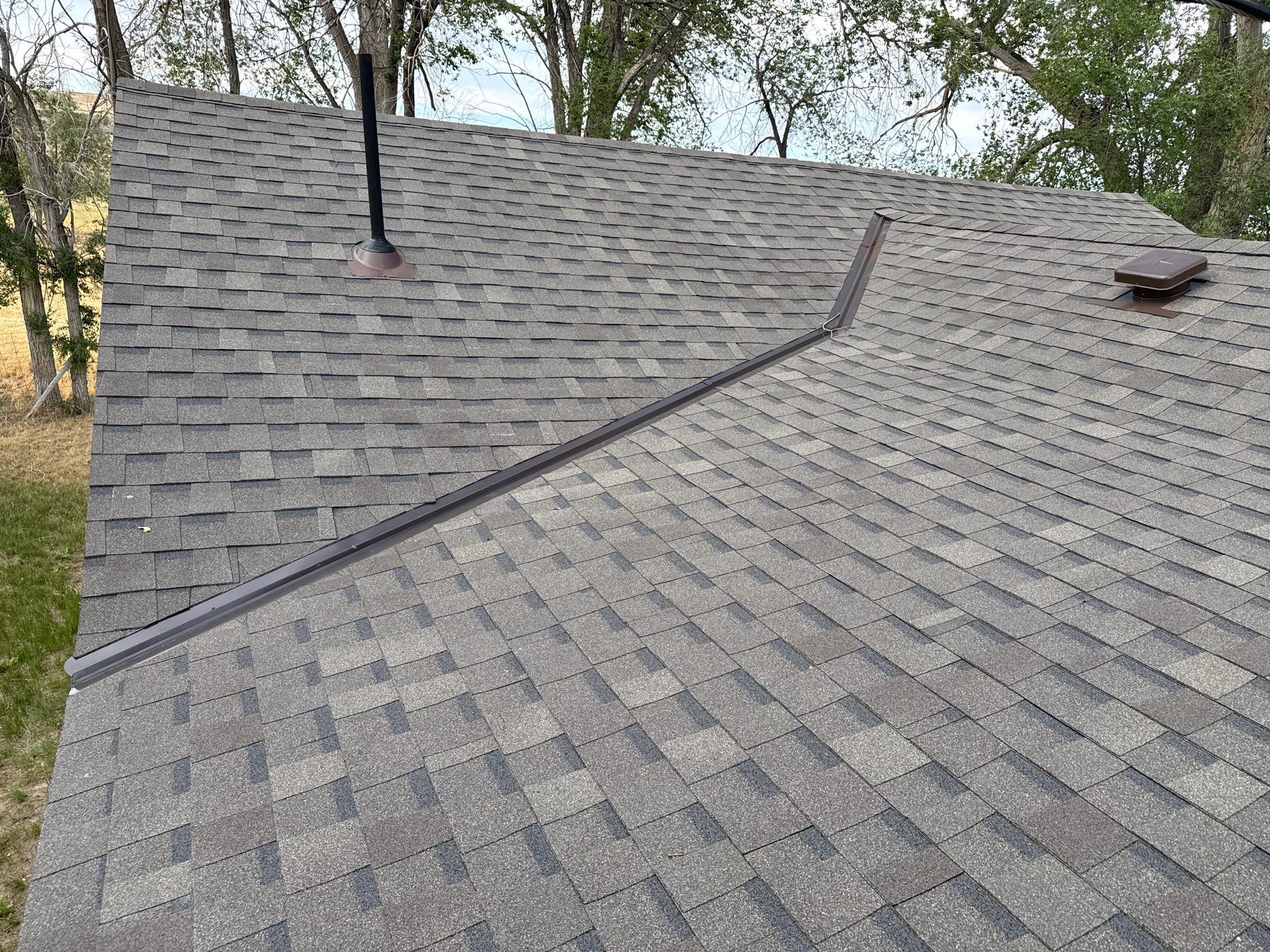 Residential Roof Replacement with Architectural Shingles in King Hill by Olive Roofing