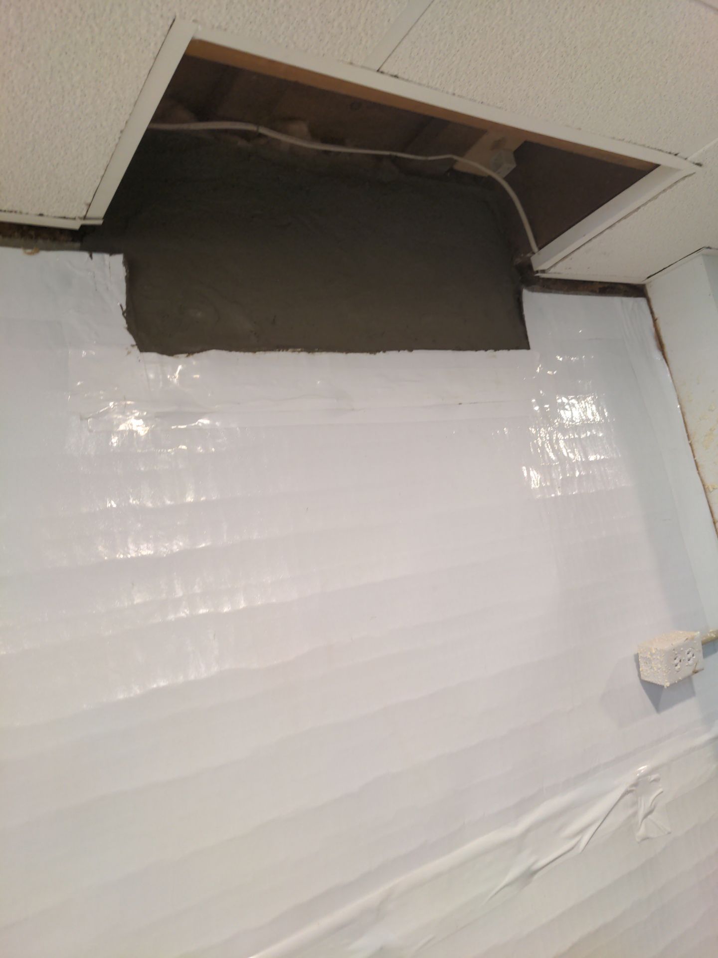 Interior Basement Waterproofing System and Egress Window Installation by Toledo Basement Repair 