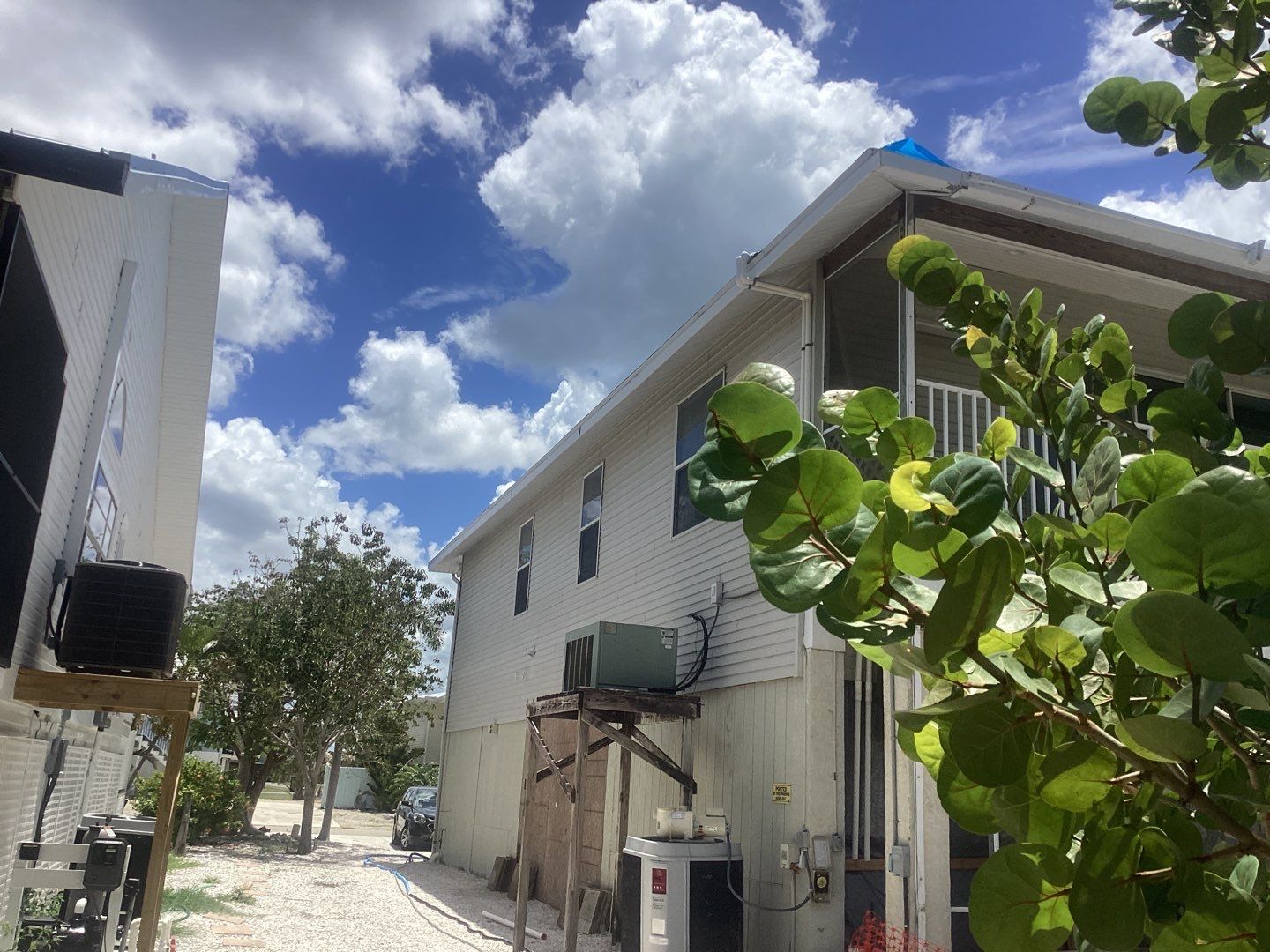 Complete Gutter System with Downspouts & Guards in Fort Myers Beach FL by Gutter Professors
