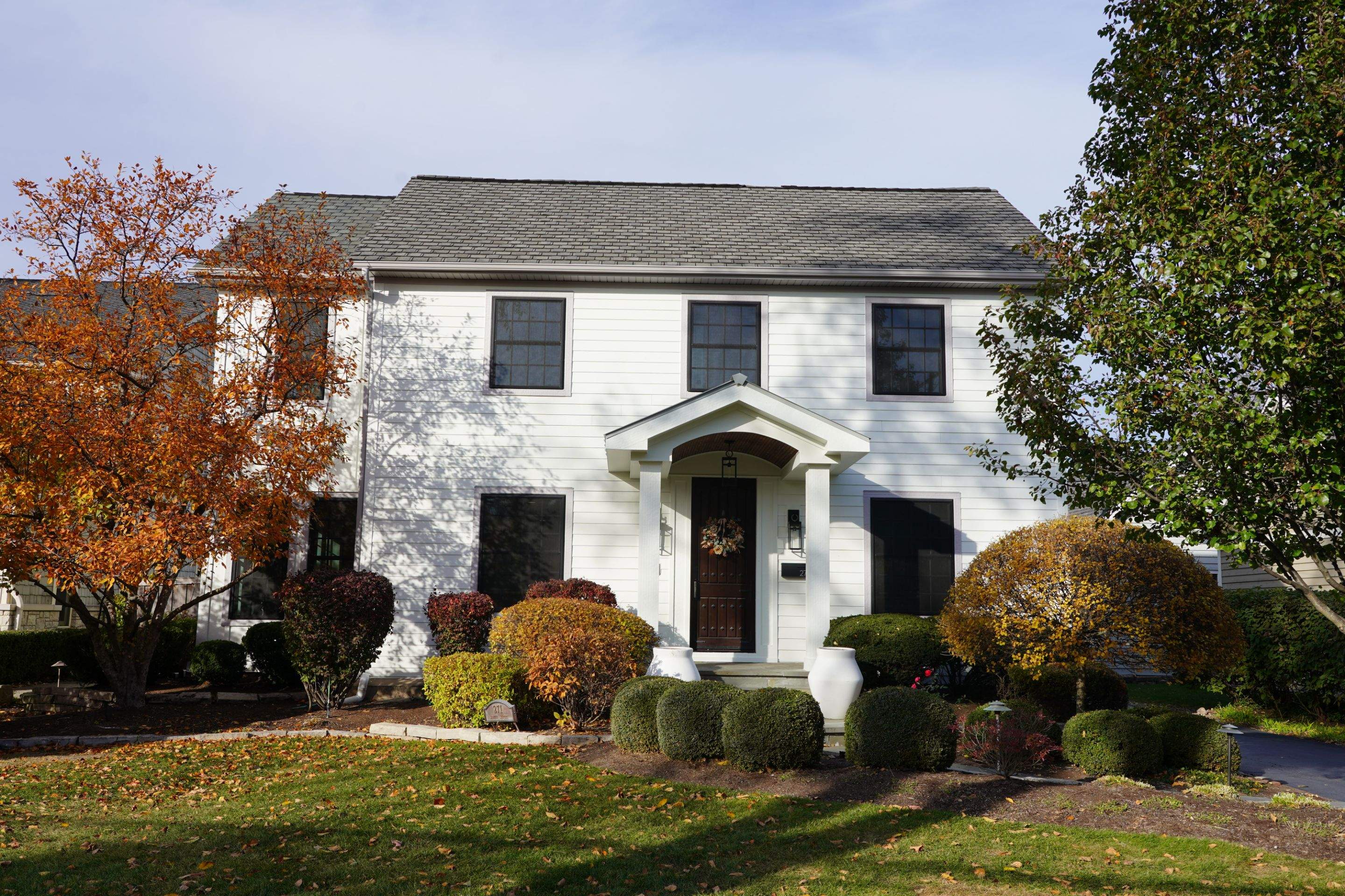 Exterior Renovation in Elmhurst with James Hardie Siding and Windows by Great American Exteriors