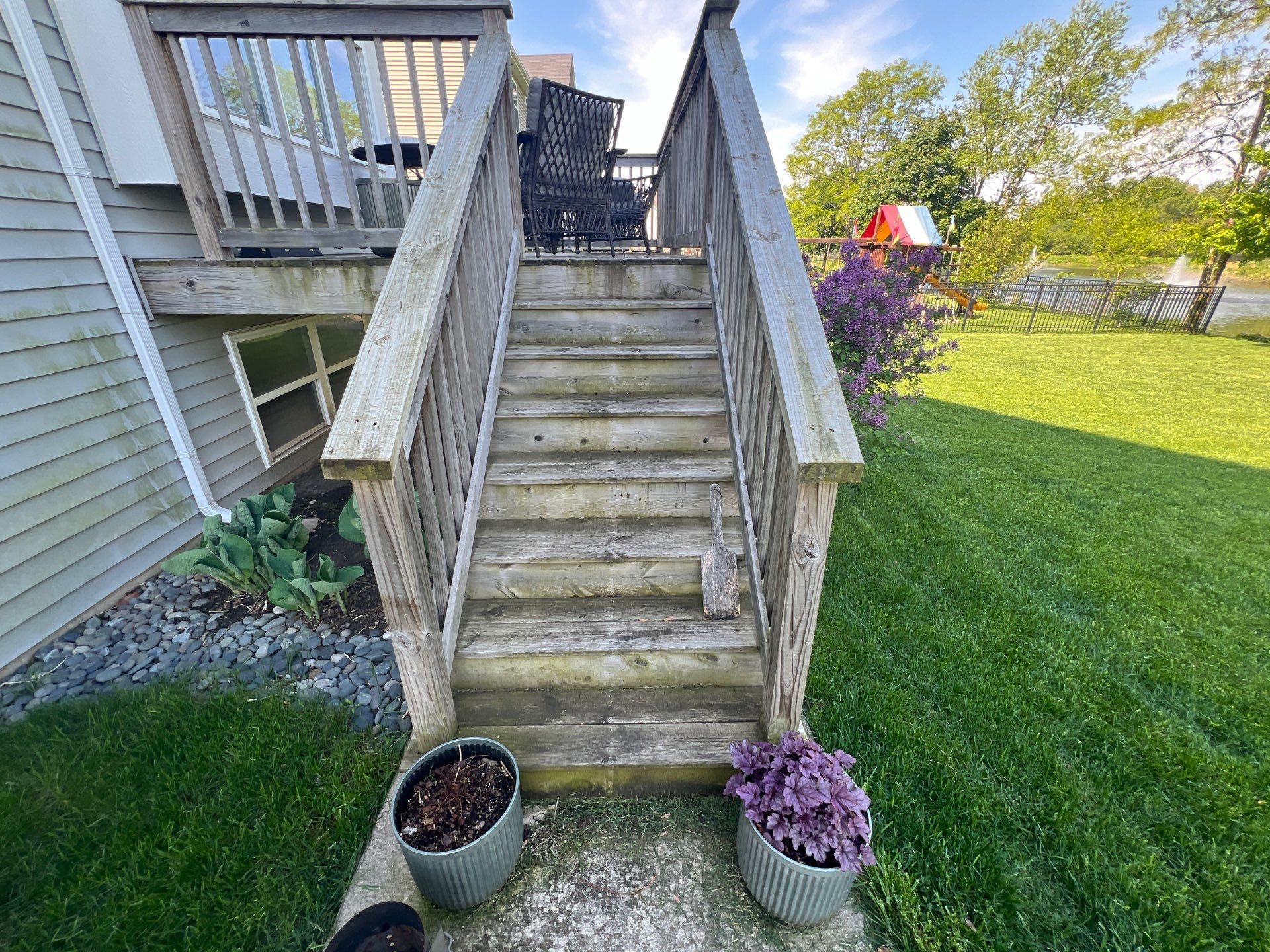 wood deck cleaning and staining by Northern Power Washing LLC.