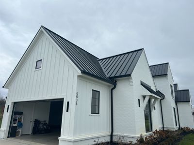 Residential Roofing Installation using Standing Seam Metal - Frost Black