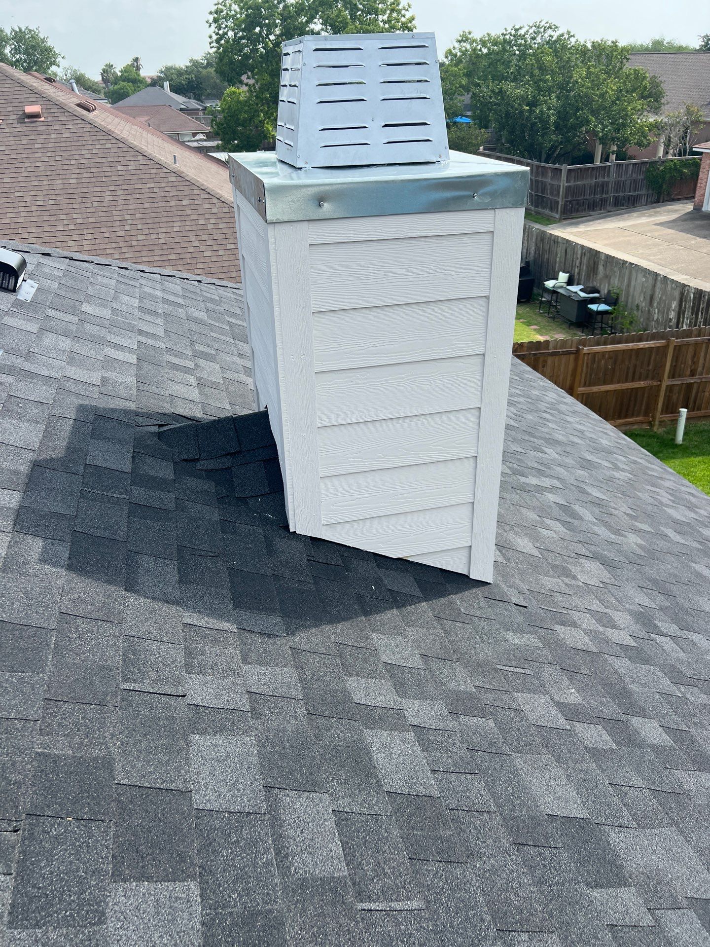 Nothing looks nicer than a little black roof by Bayfront Roofing and Construction